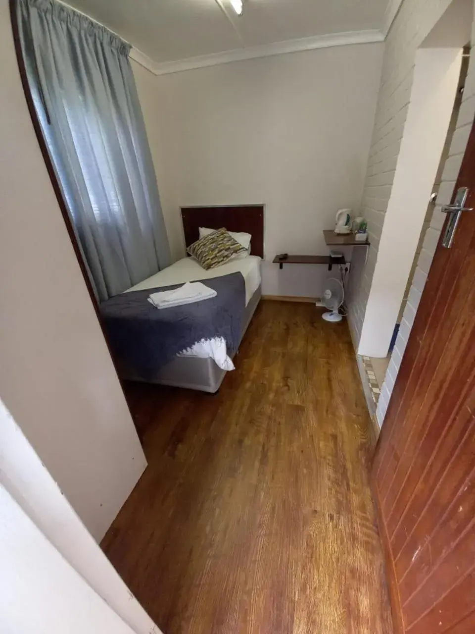 Photo of the whole room, Bed in 21 On Coetzee Guest House