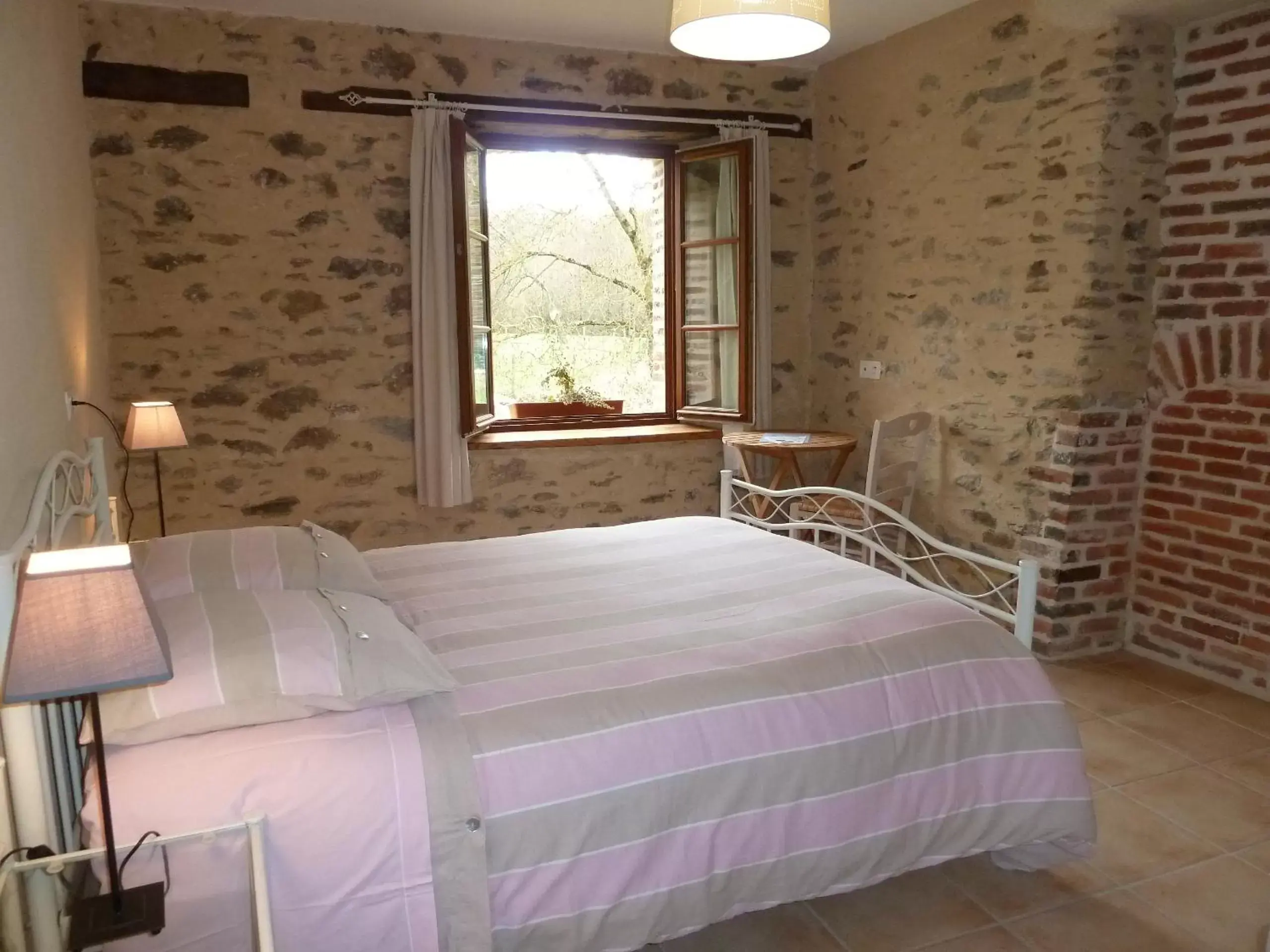 Photo of the whole room, Bed in Moulin de Drapras