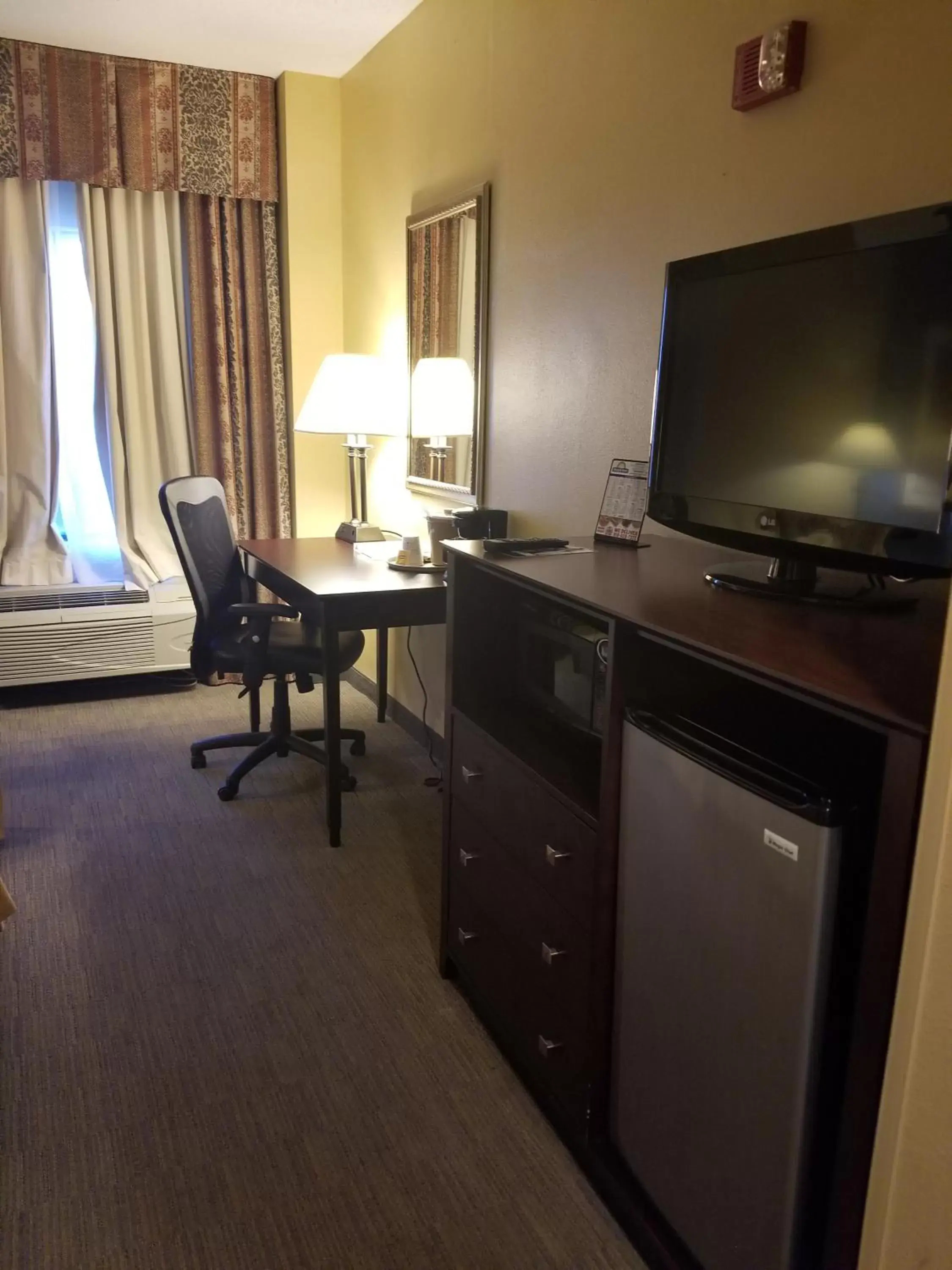 TV and multimedia, TV/Entertainment Center in Days Inn by Wyndham Tulsa Central