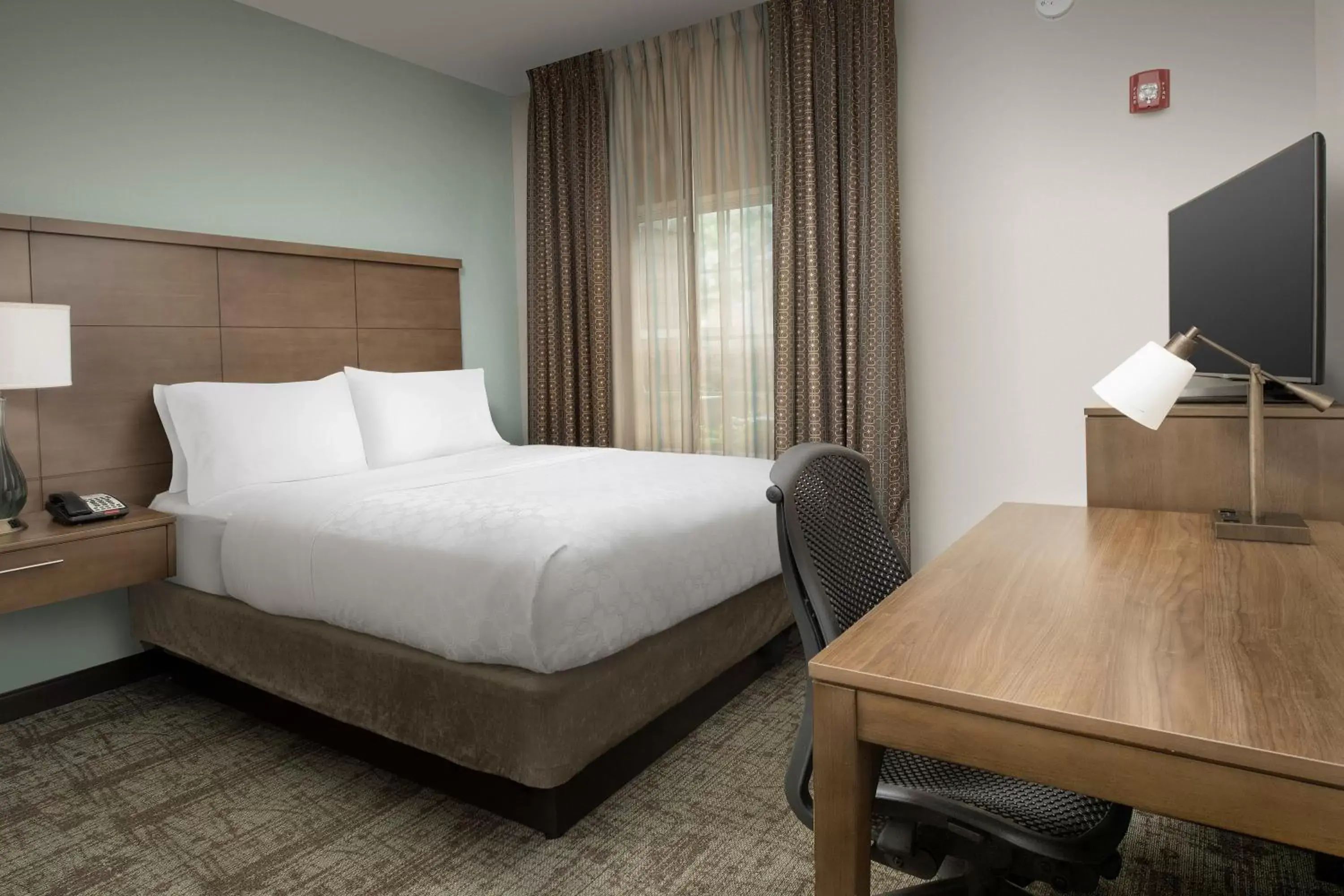 Photo of the whole room, Bed in Staybridge Suites Greenville I-85 Woodruff Road, an IHG Hotel