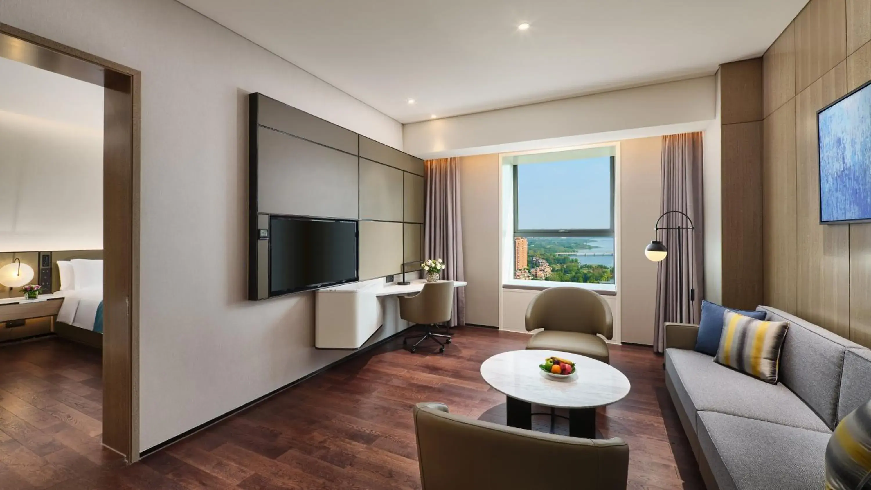 Bedroom, Seating Area in Crowne Plaza Wuhan Development Zone, an IHG Hotel