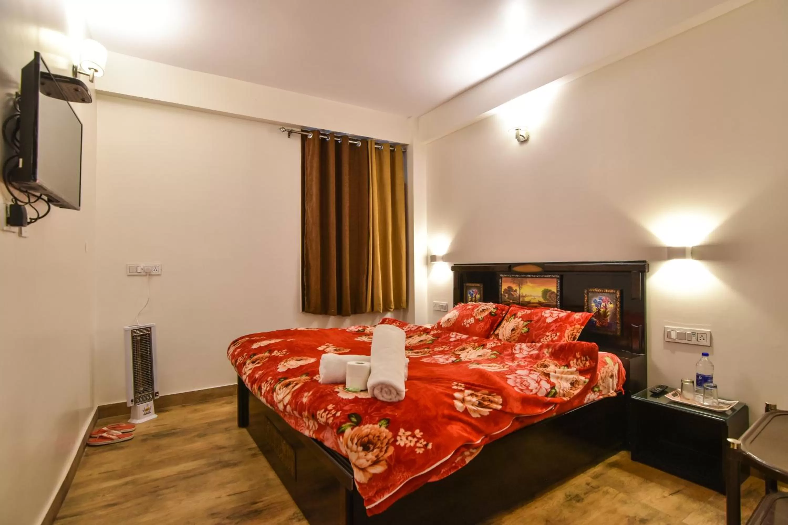 Bedroom, Bed in Dhanlaxmi Apartments