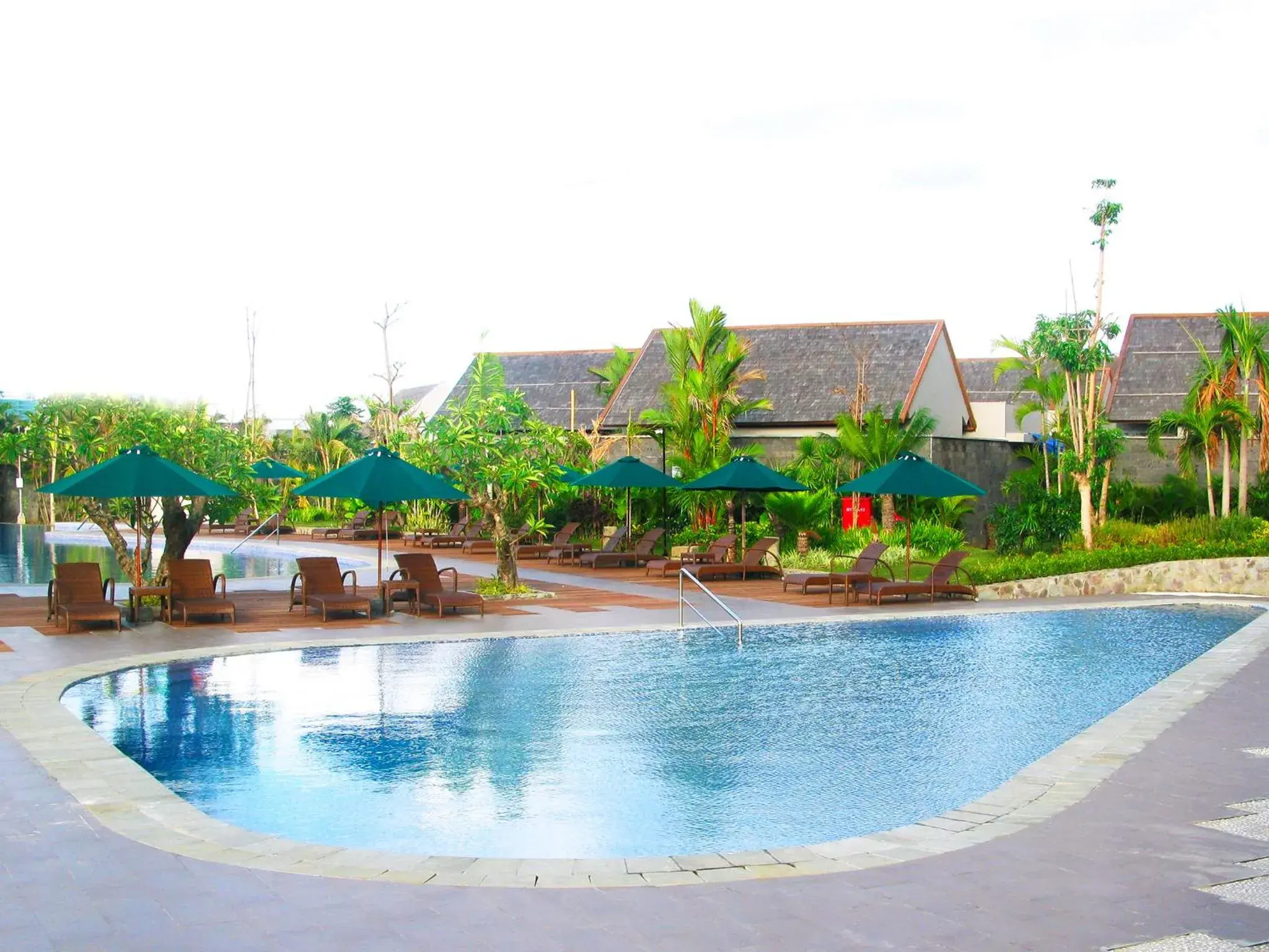 Swimming pool, Property Building in Gammara Hotel Makassar