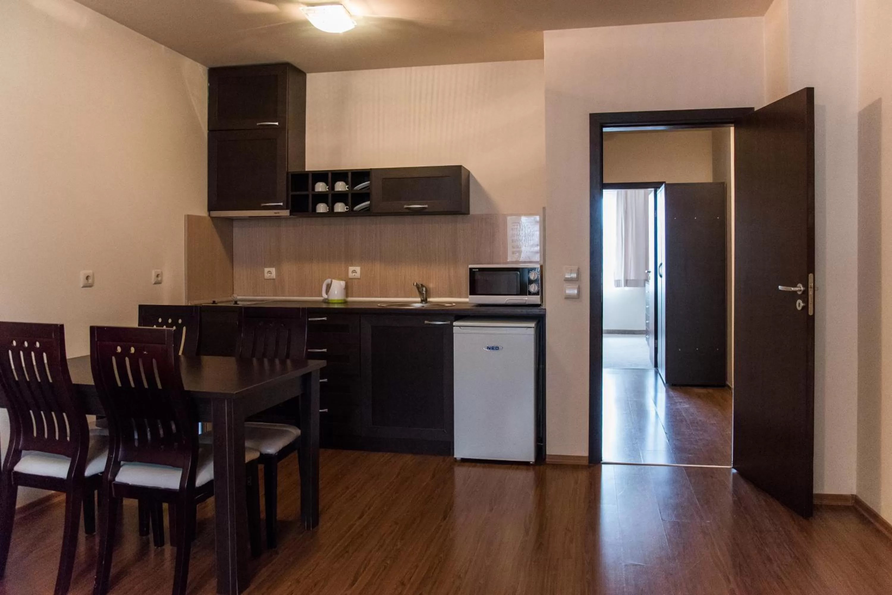 Kitchen or kitchenette in Bansko Royal Towers Hotel