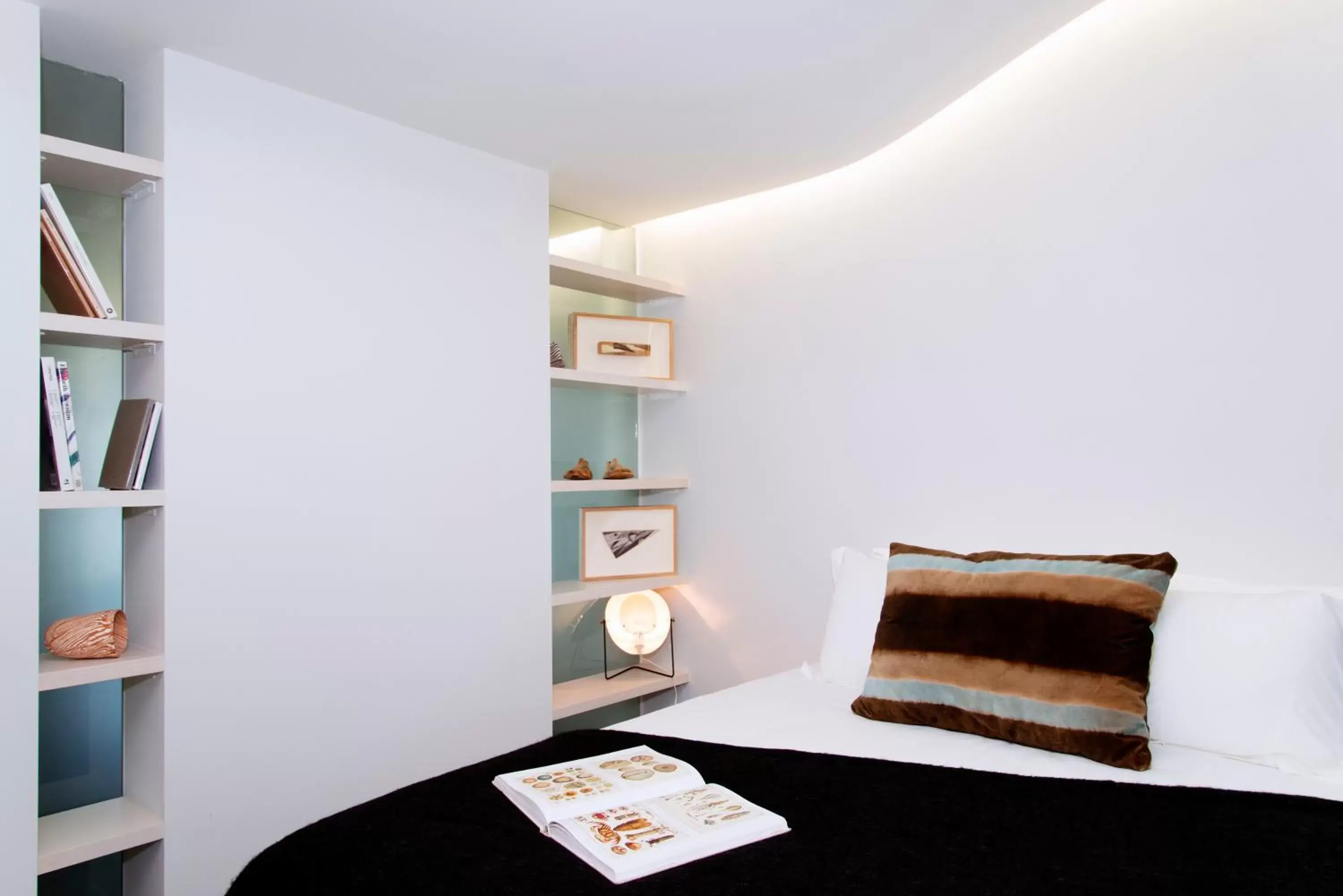 Bed in Nishi Apartments Eco Living by Ovolo