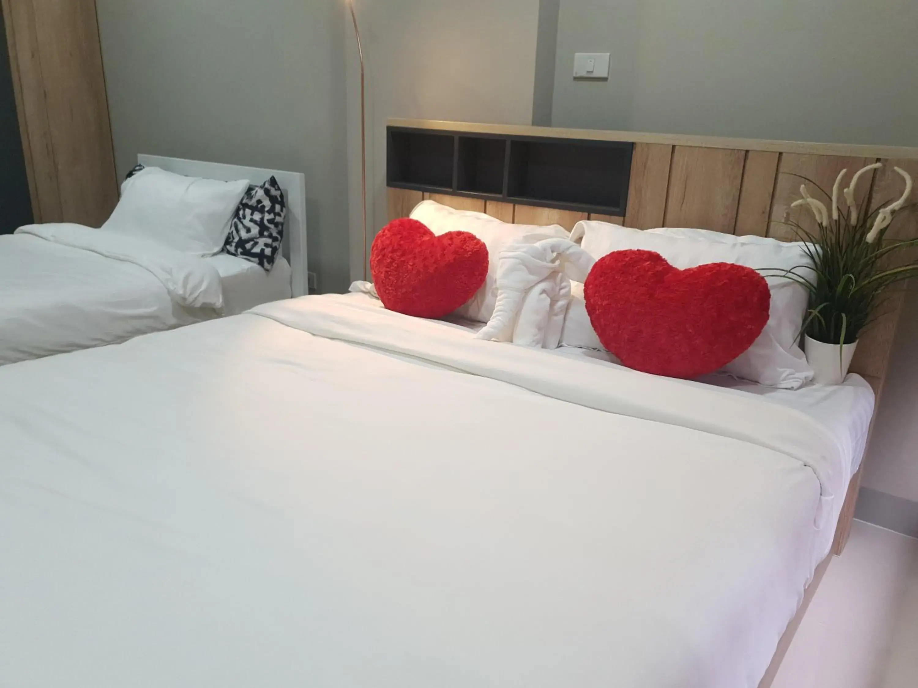 Bed in iResidence Hotel Pathumthani