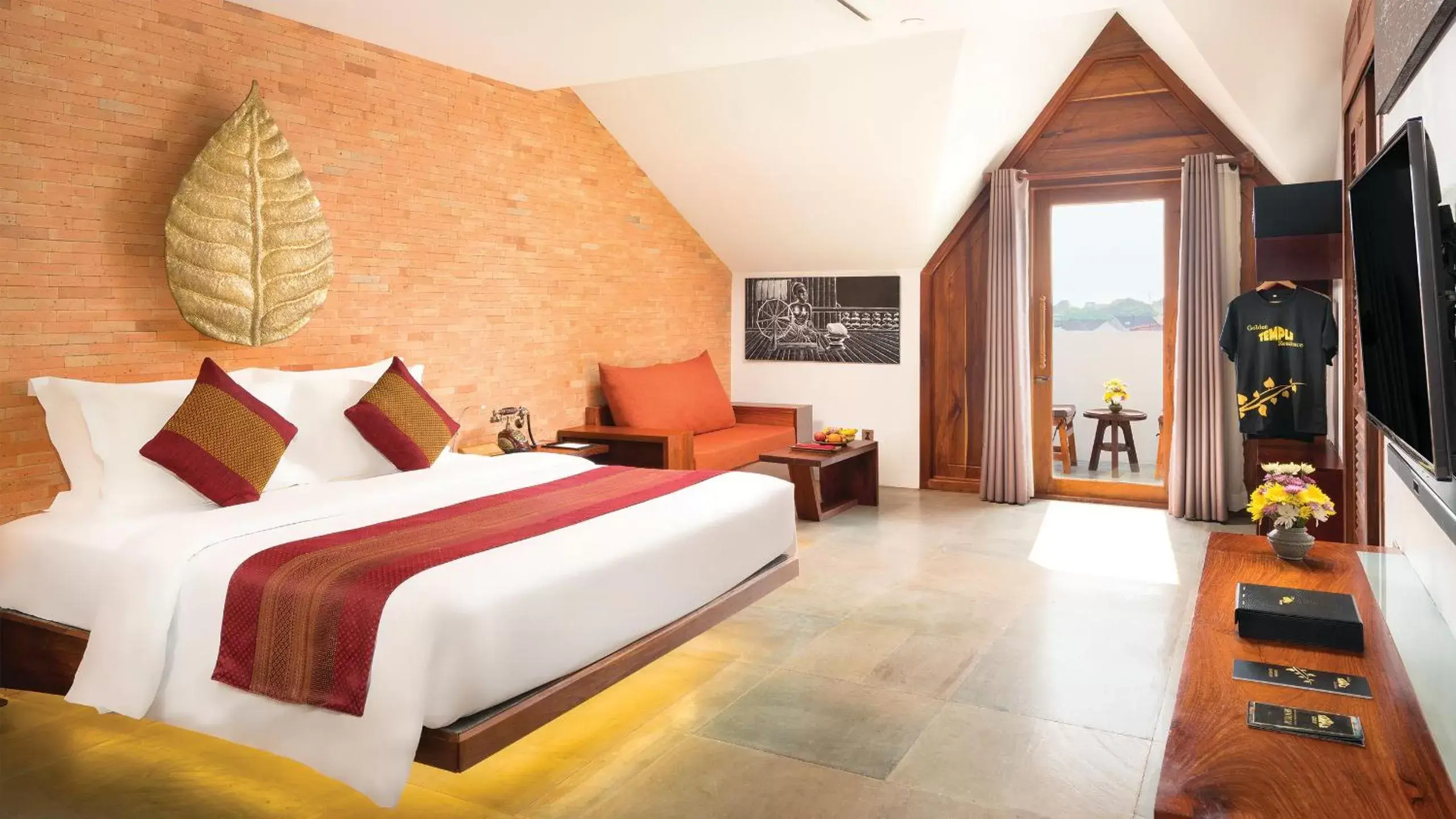 Seating area, Bed in Golden Temple Residence