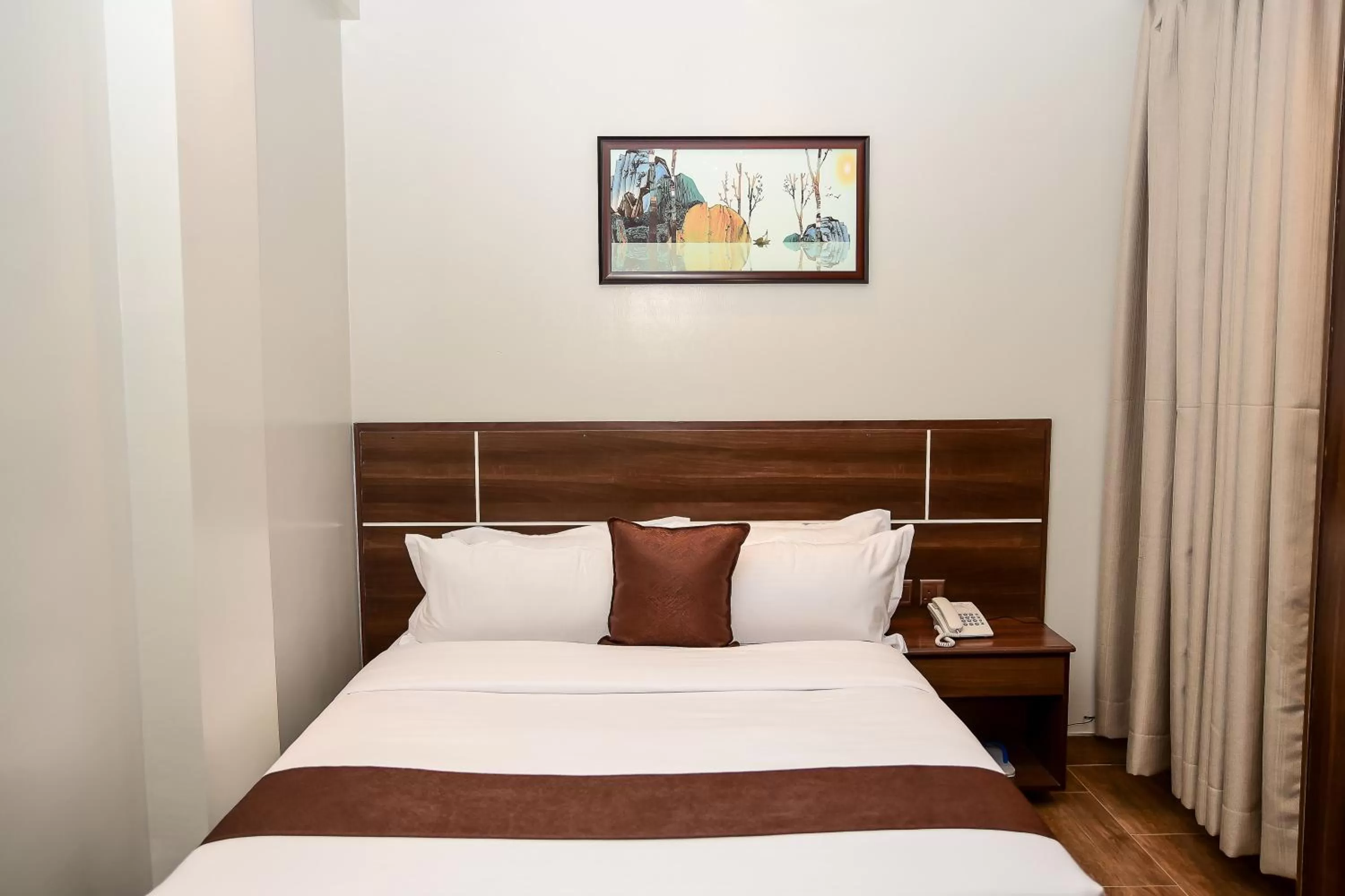 Bed in LA BEILA HOTEL MERU