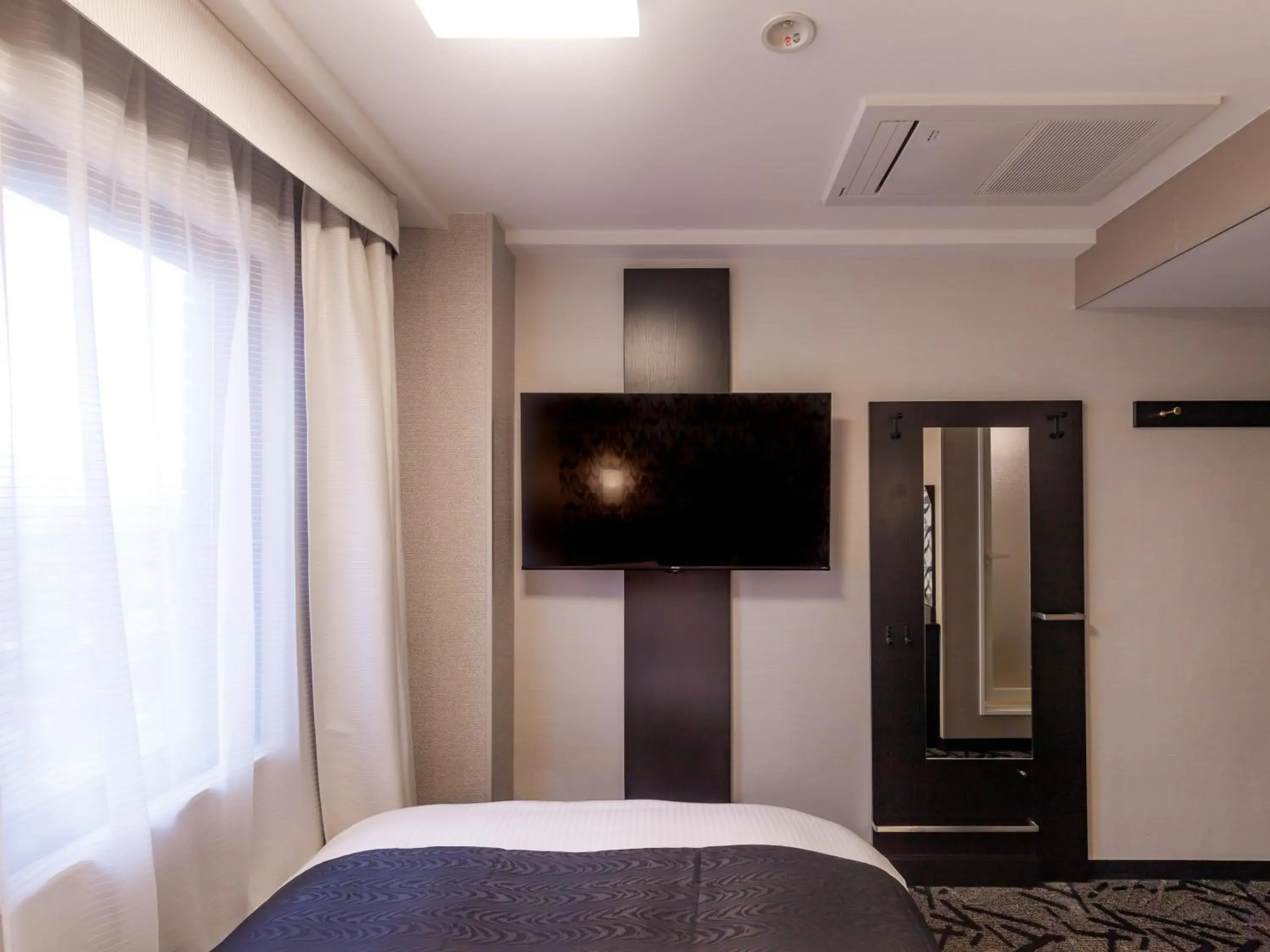 Photo of the whole room, TV/Entertainment Center in Apa Hotel Toyama