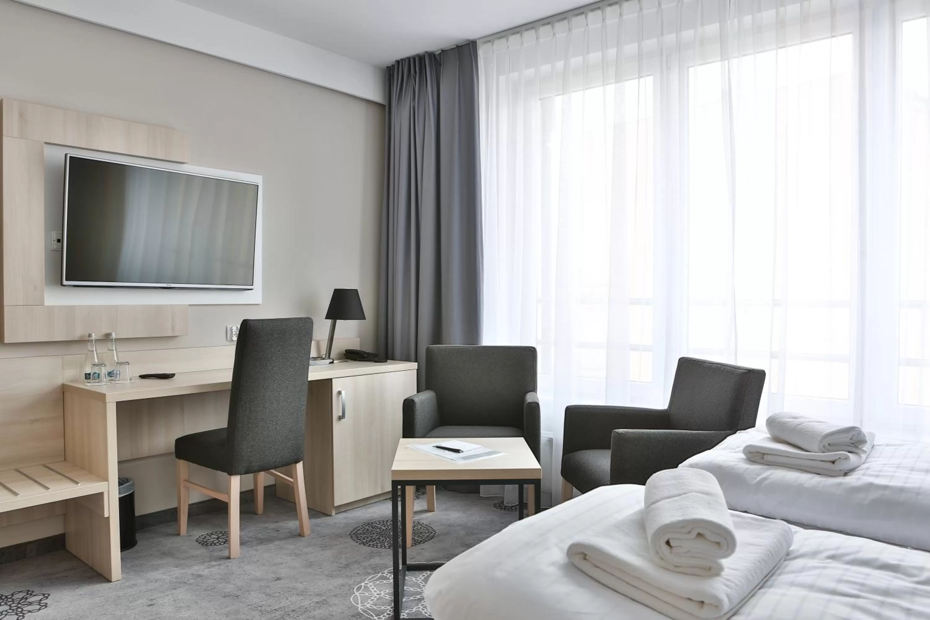 Photo of the whole room, Bed in Hotel Lantier & Swimming Pool Zone