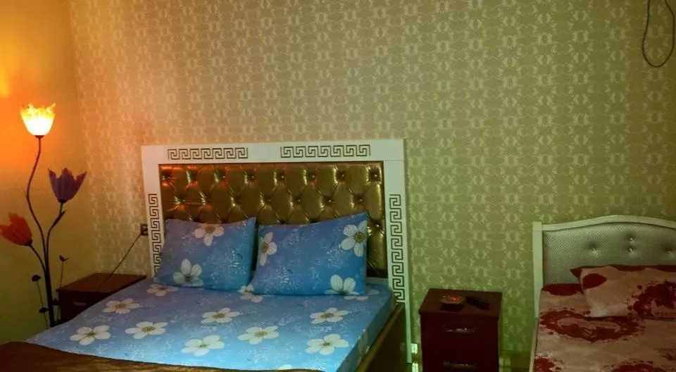 Bed in Hotel Buza
