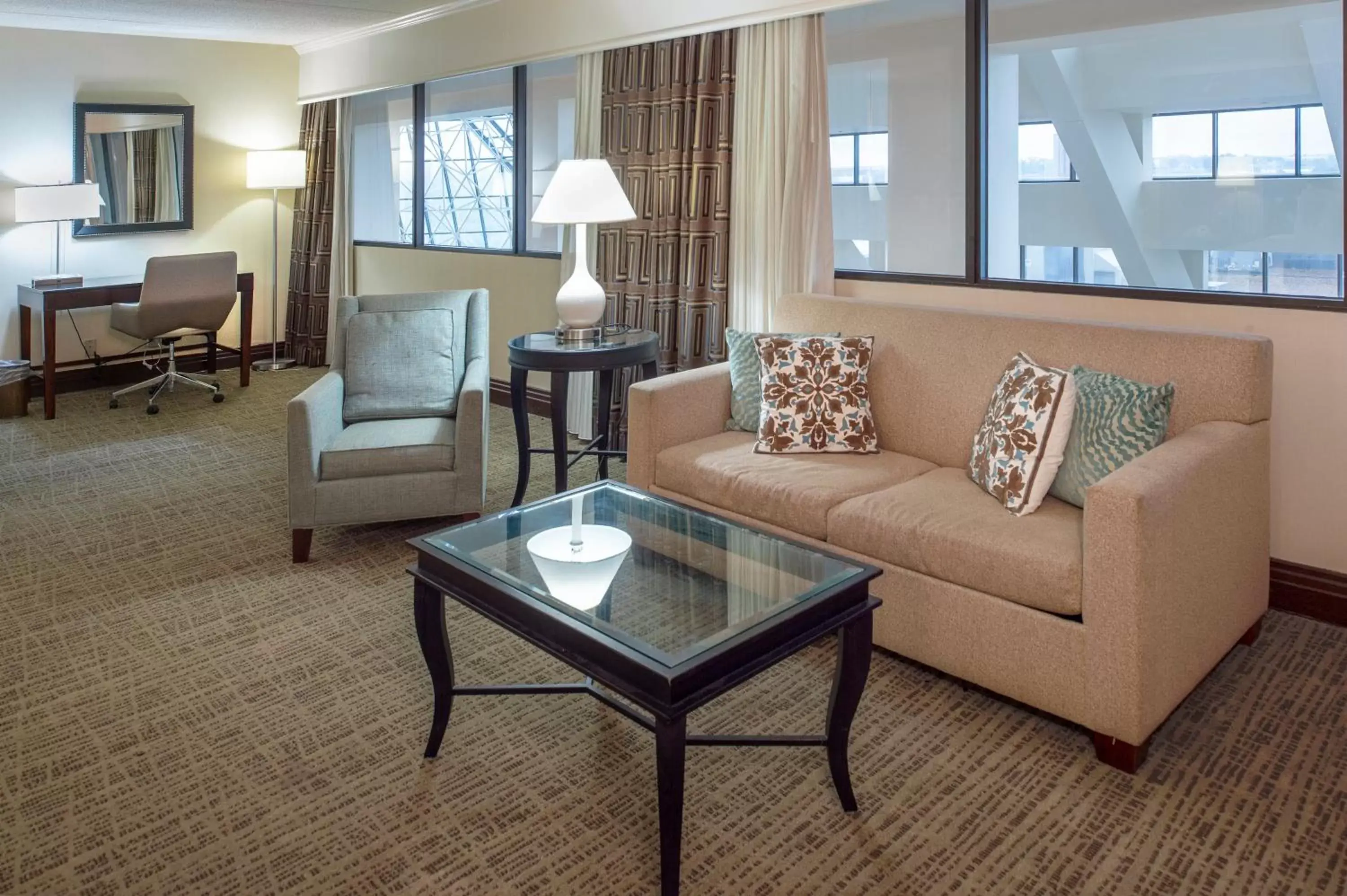 Photo of the whole room, Seating Area in Crowne Plaza Hotel St. Louis Airport, an IHG Hotel