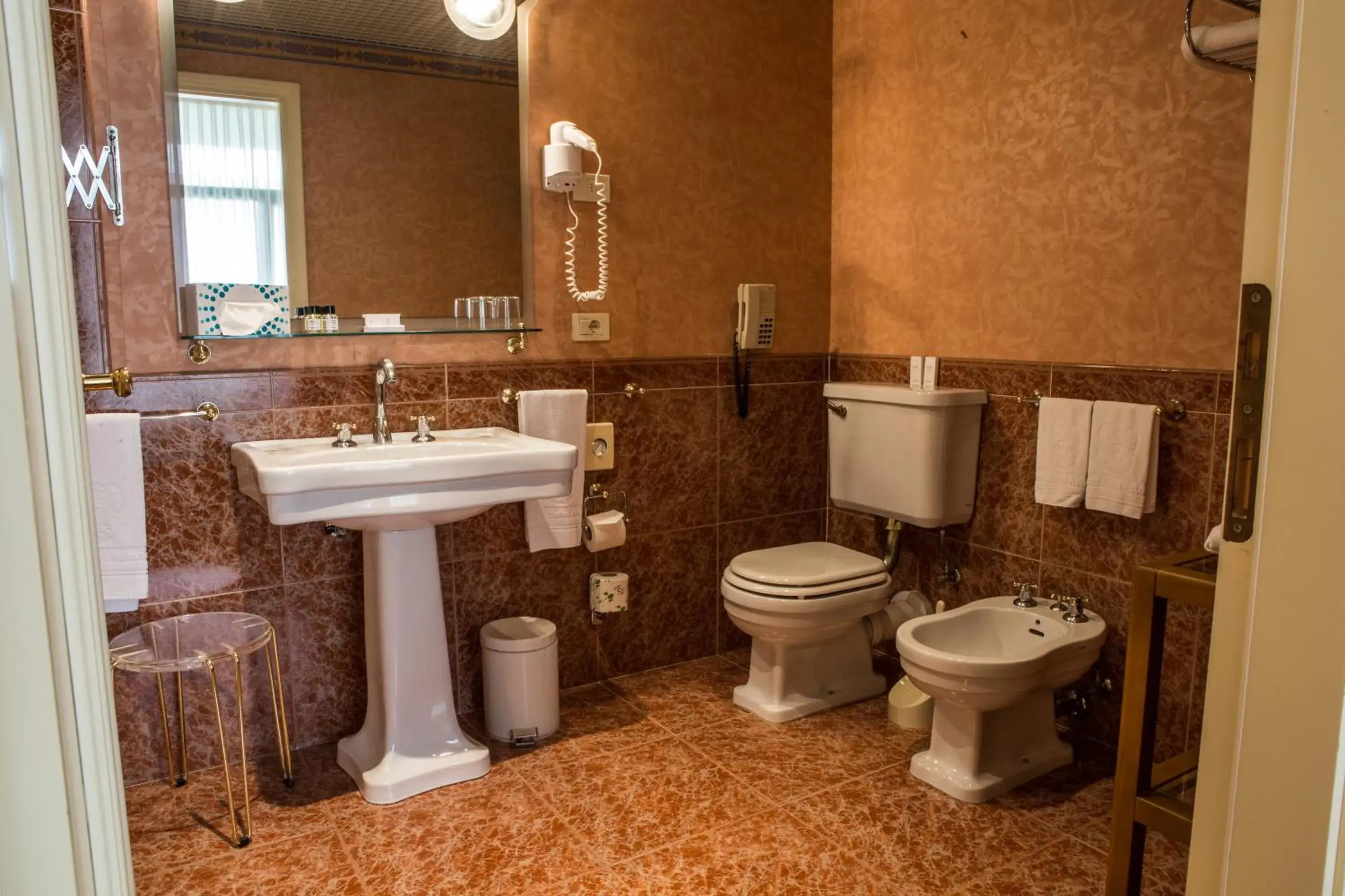 Bathroom in Grand Hotel Astoria