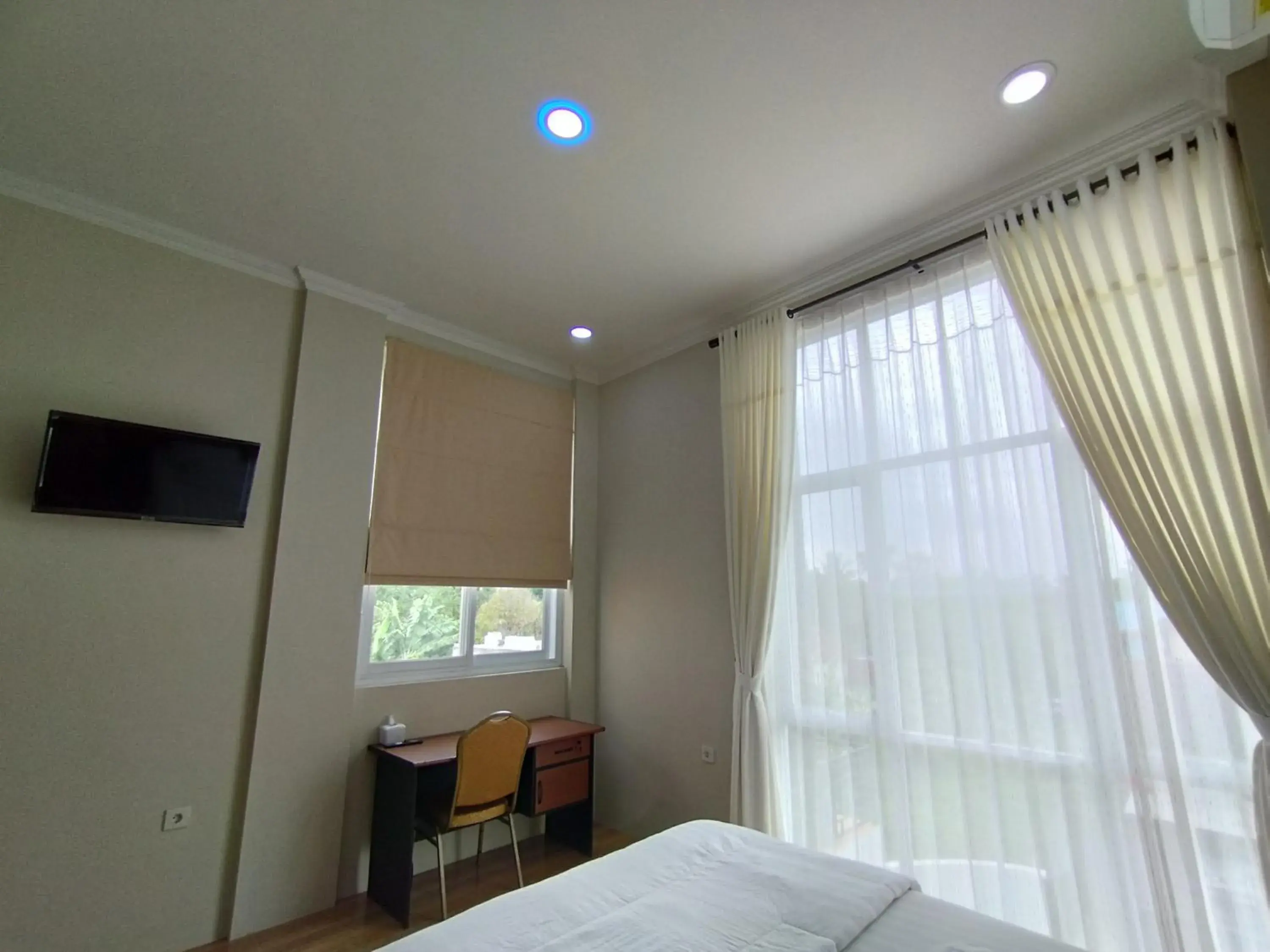 View (from property/room), TV/Entertainment Center in Saira Hotel dan Homestay Syariah