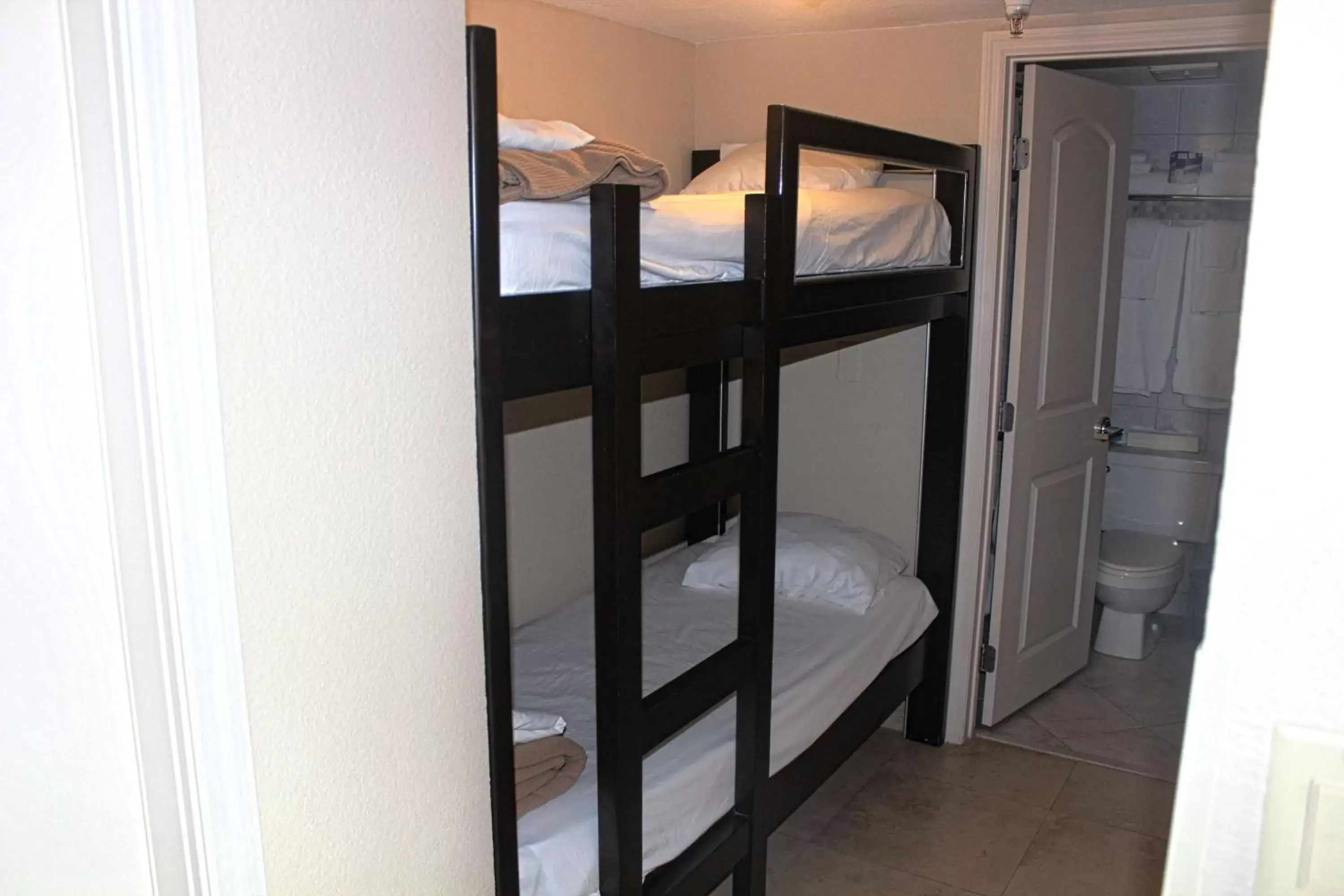 Photo of the whole room, Bunk Bed in Radisson Suite Hotel Oceanfront