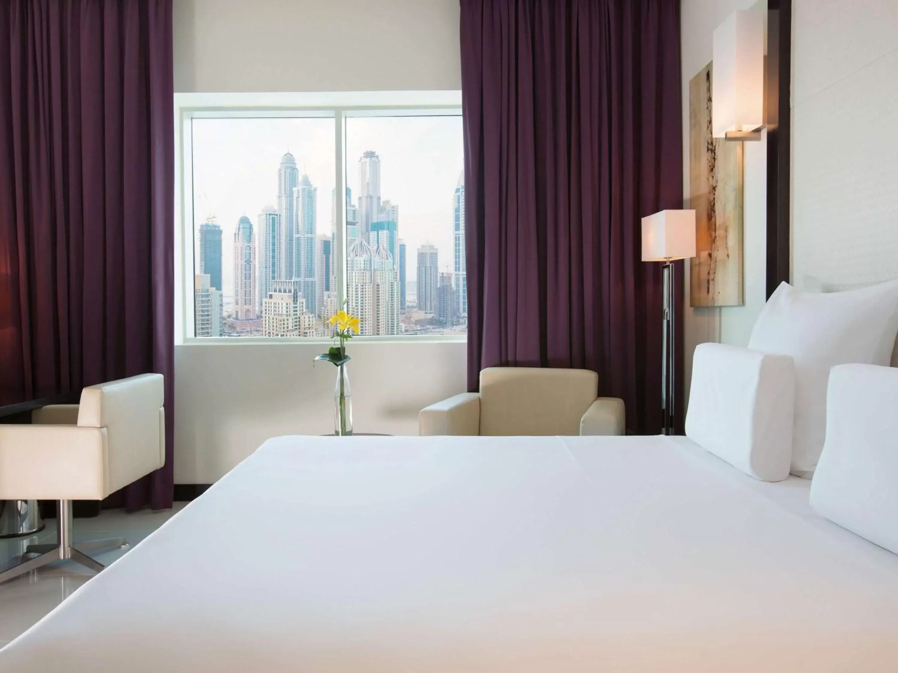 Photo of the whole room, Bed in Pullman Dubai Jumeirah Lakes Towers