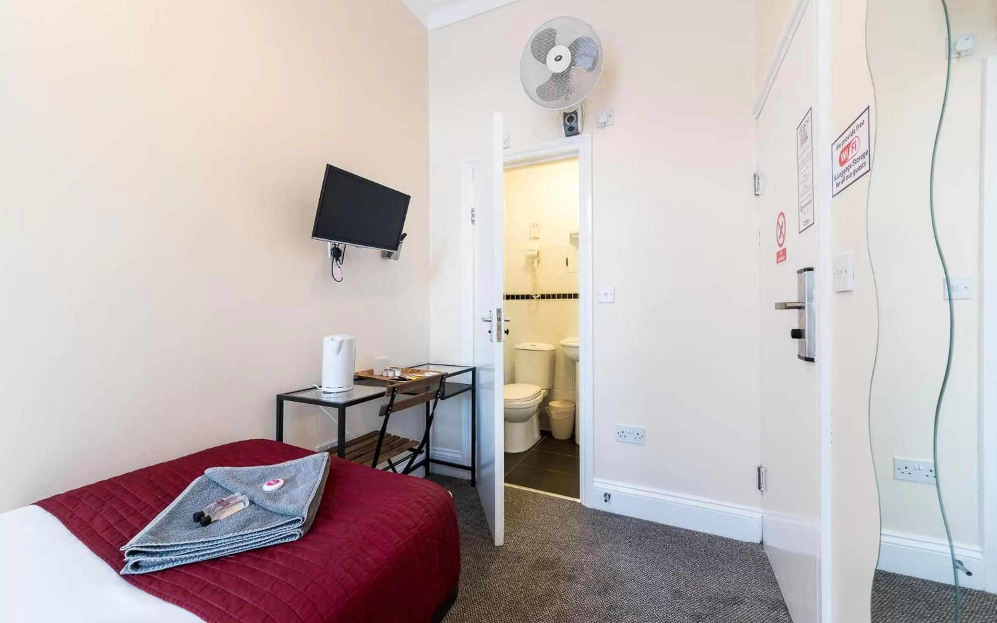 TV/Entertainment Center in Hellenic Hotel by Saba