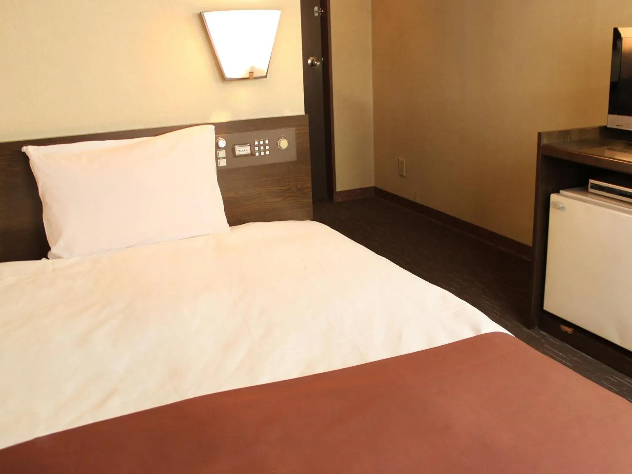 Bed in HOTEL LiVEMAX BUDGET Chofu-Ekimae