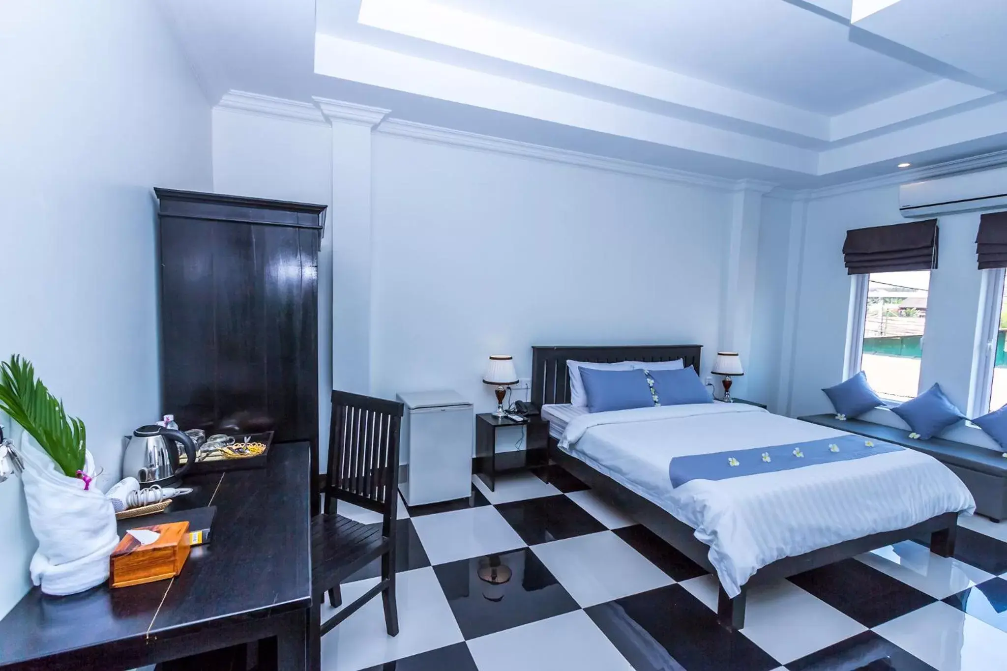 Photo of the whole room, Bed in Rithy Rine Angkor Residence