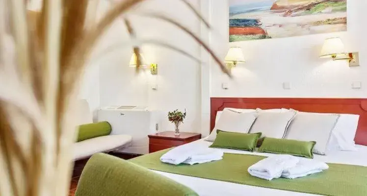 Photo of the whole room, Bed in Rigas Hotel Skopelos