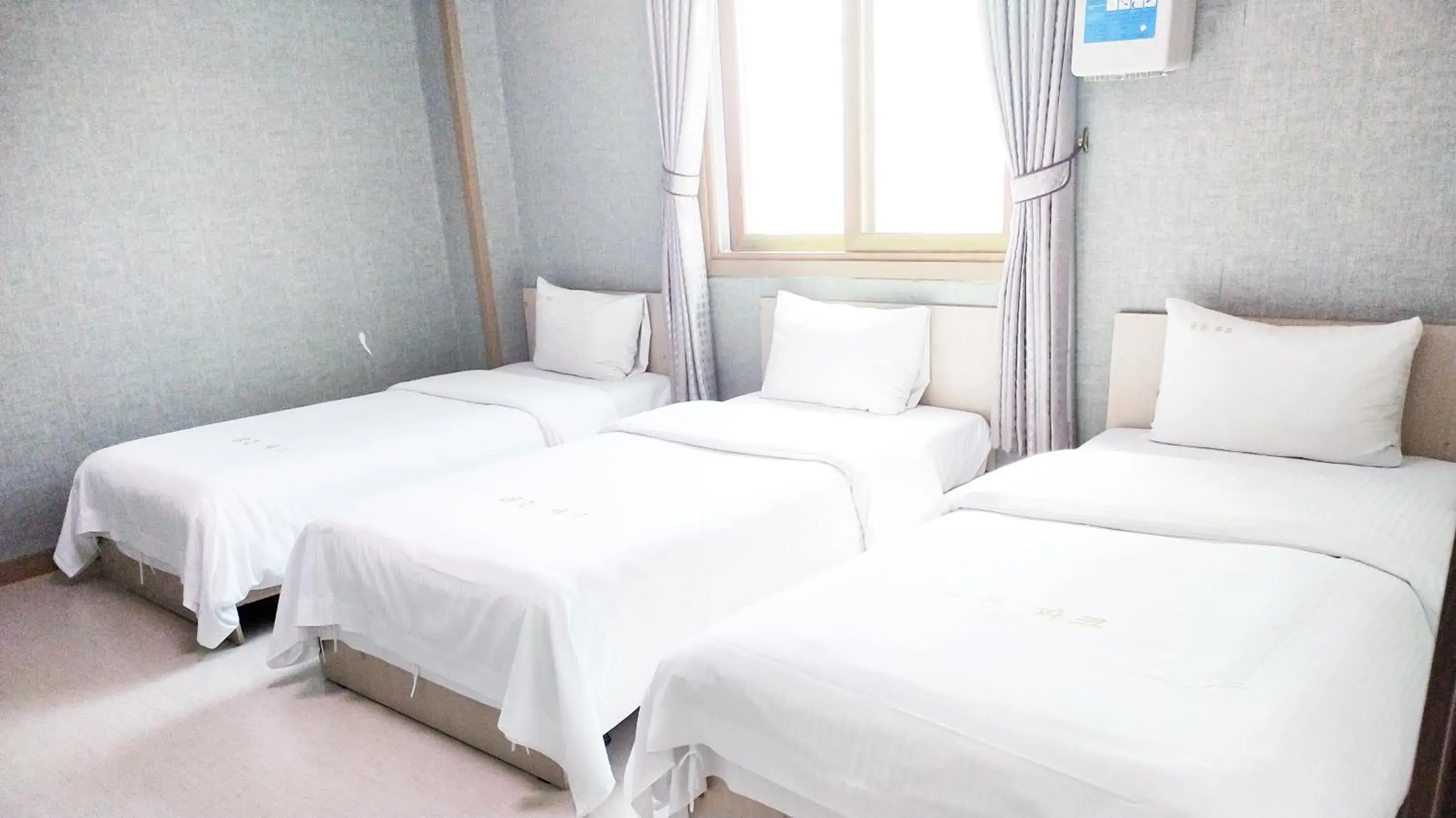 Bed in Golden Park Hotel Jeju