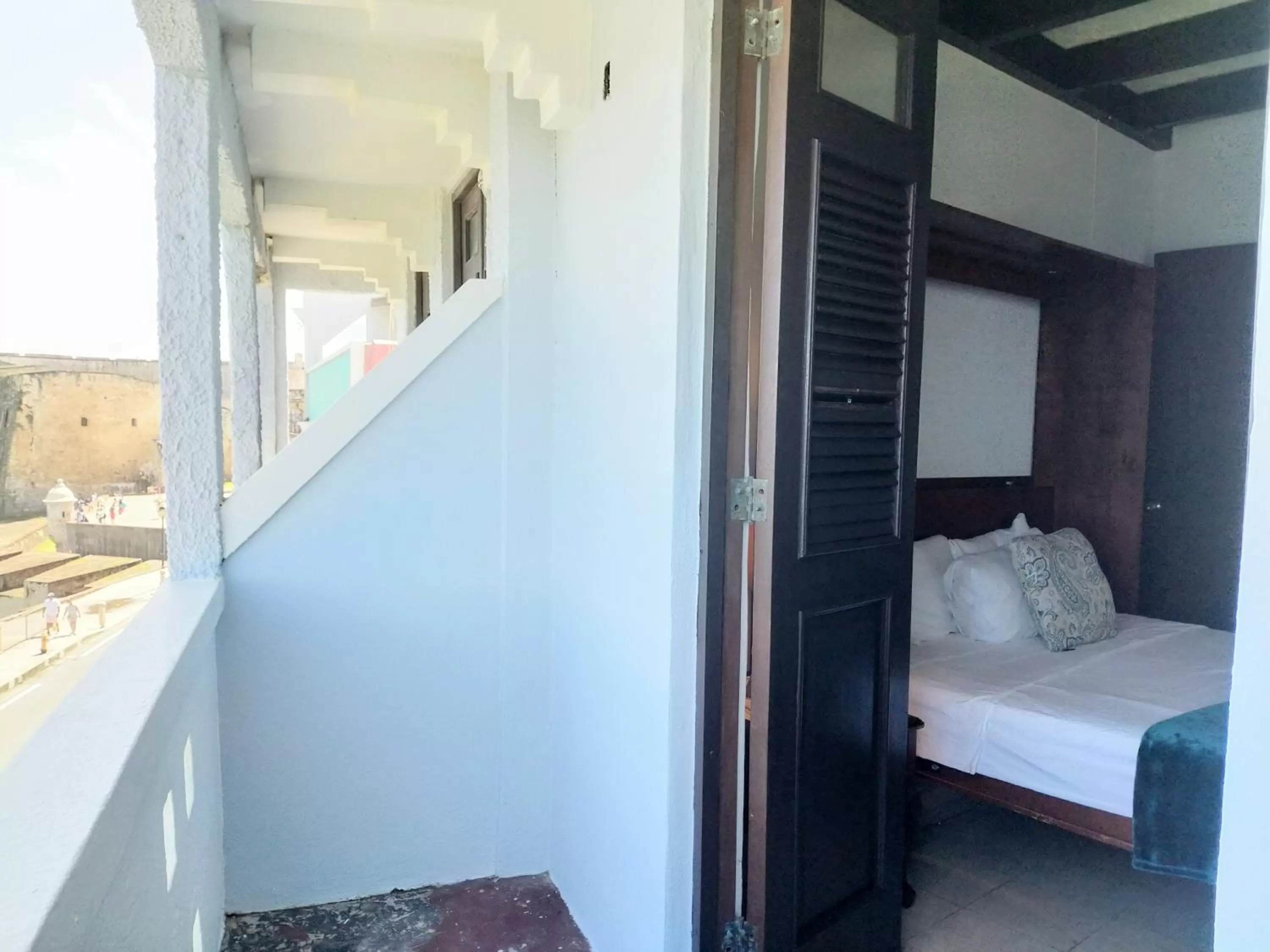 Bed in La Capitana Old San Juan Building