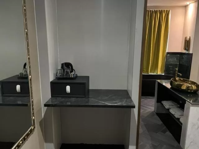 hair dresser in Triple G Hotels