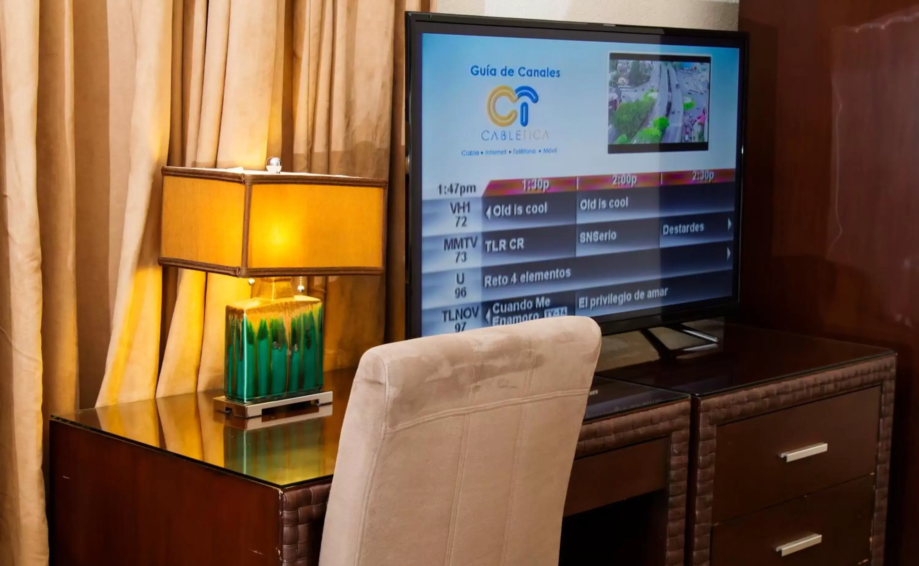 TV and multimedia, TV/Entertainment Center in Rincon del Valle Hotel & Suites