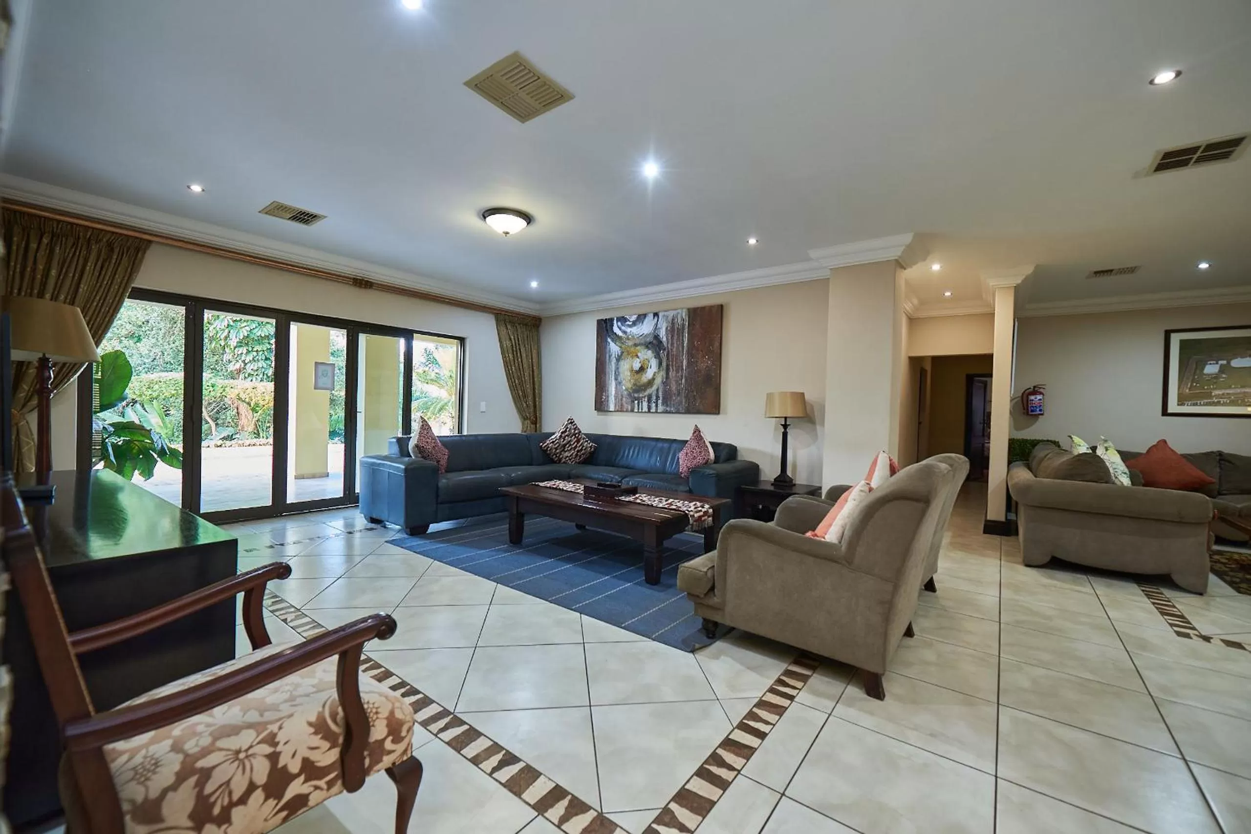 Communal lounge/ TV room, Seating Area in Ebandla Hotel & Conference Centre