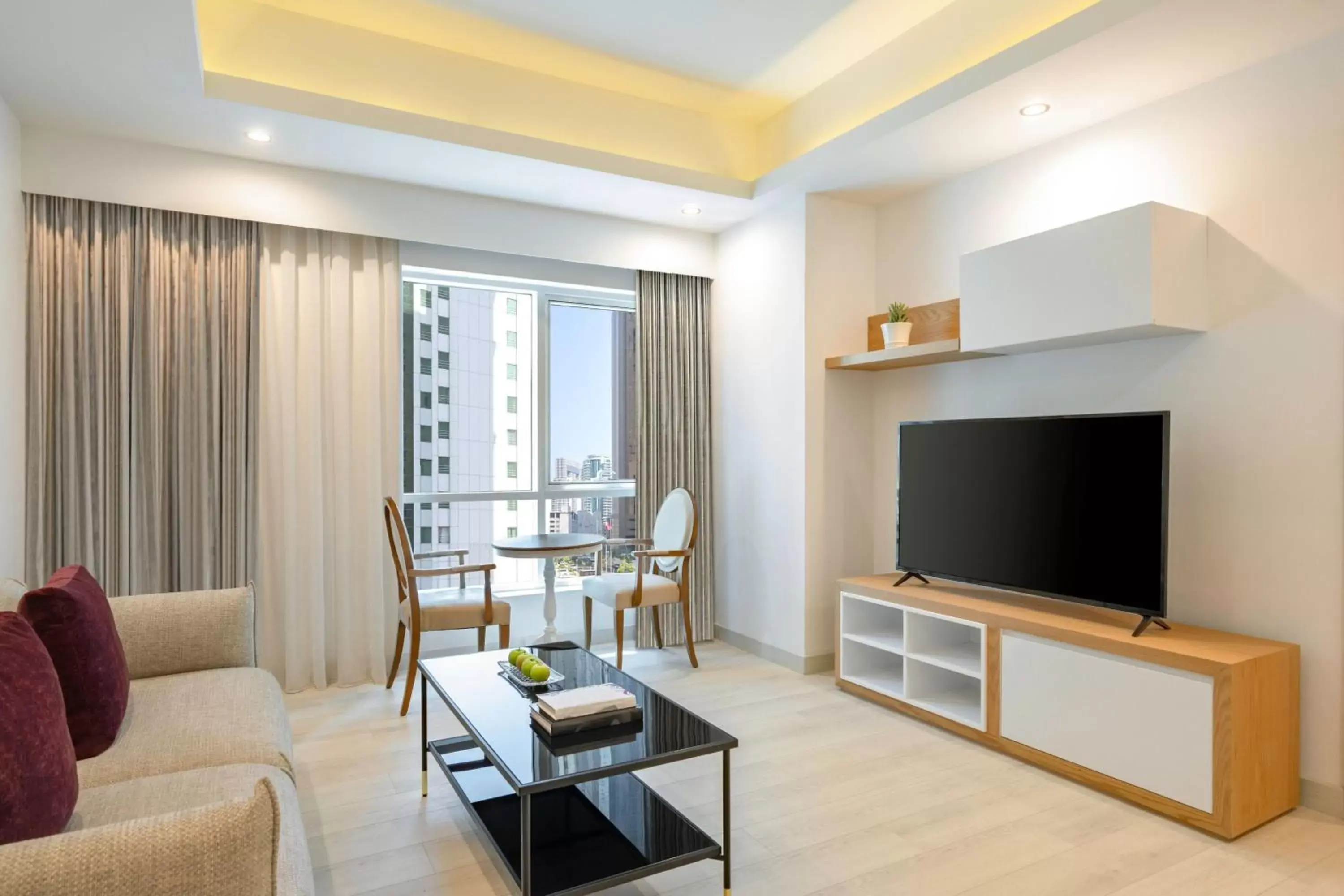 Bedroom, Seating Area in Marriott Executive Apartments City Center Doha