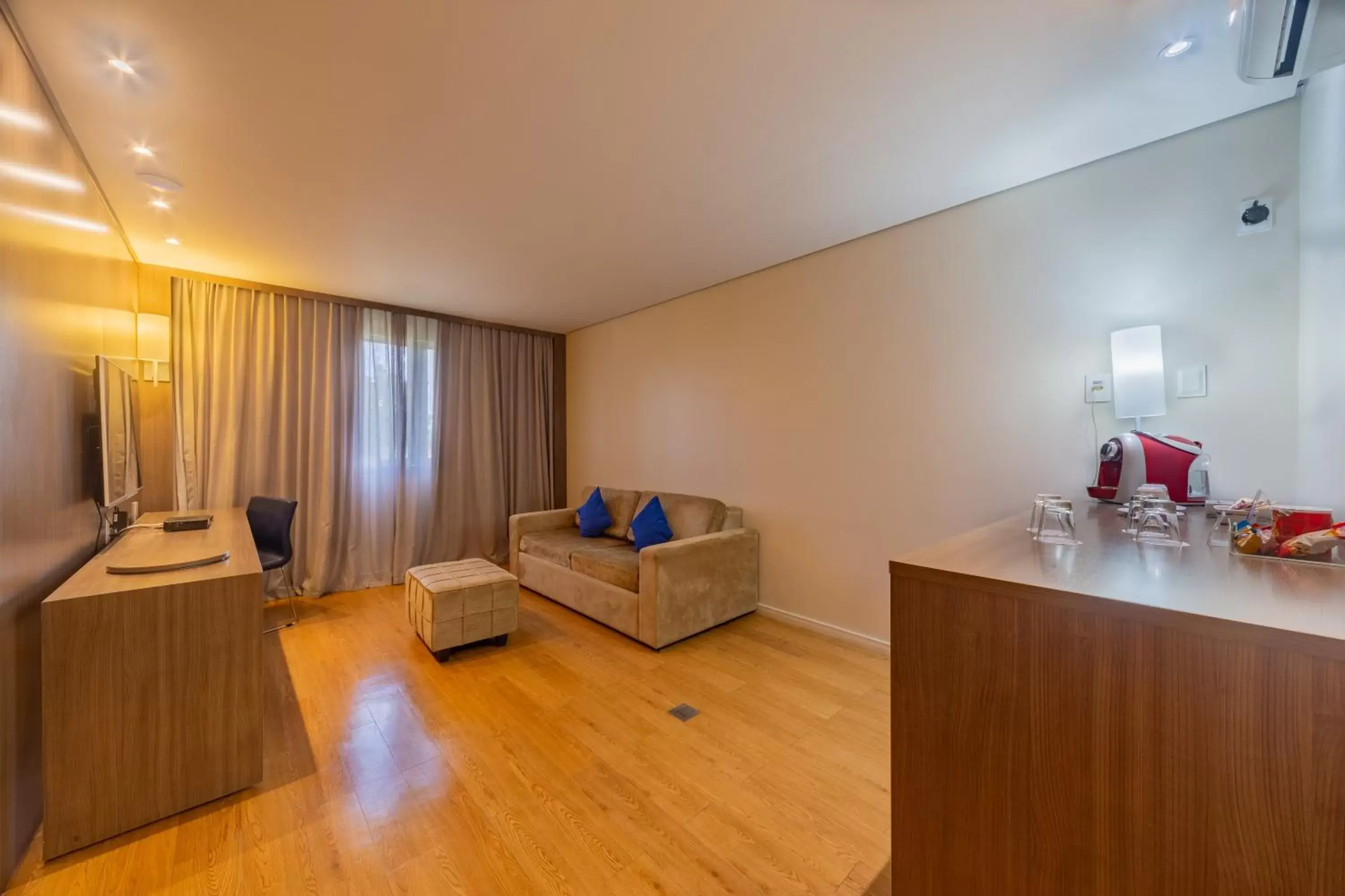 Bed, Seating Area in Novotel Manaus