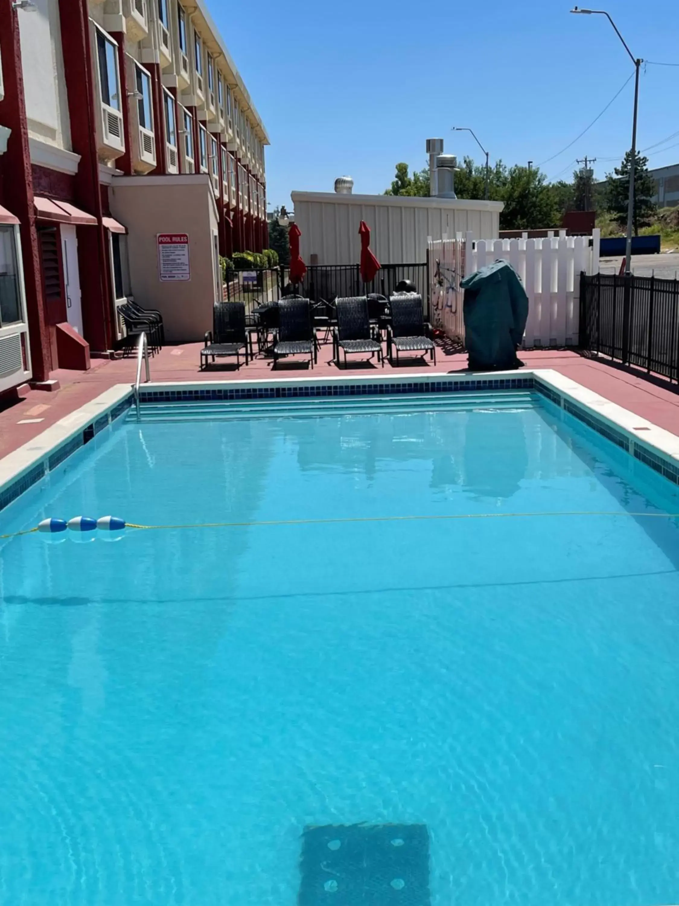 Property building, Swimming Pool in Ramada by Wyndham Oklahoma City Airport North