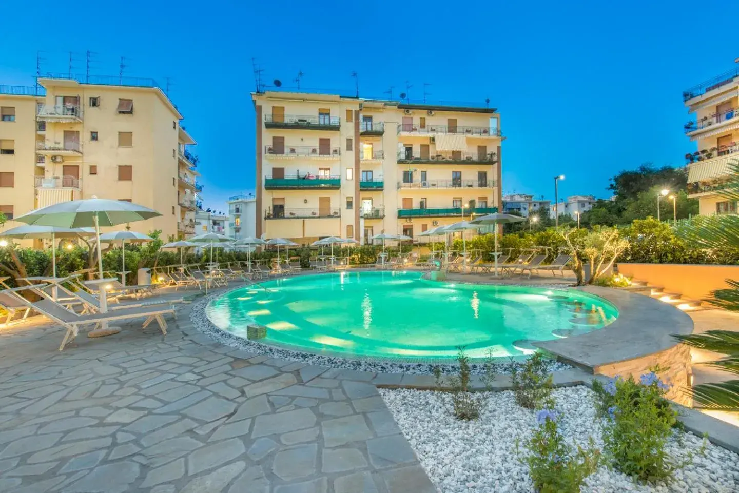 Patio, Swimming Pool in Hotel Leone