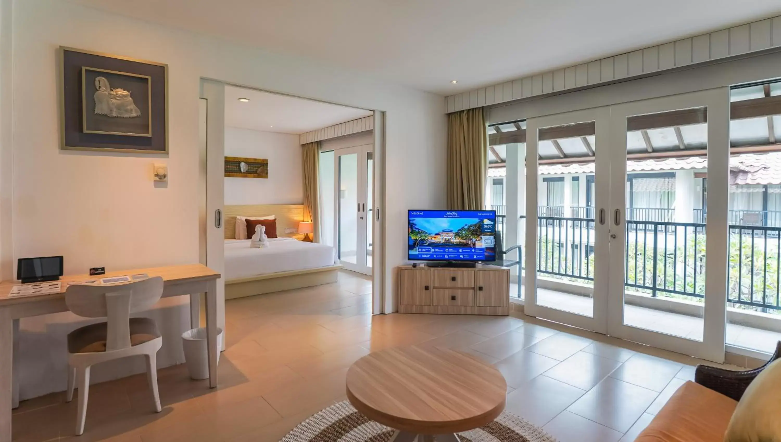 Bed, TV/Entertainment Center in Away Bali Legian Camakila Resort