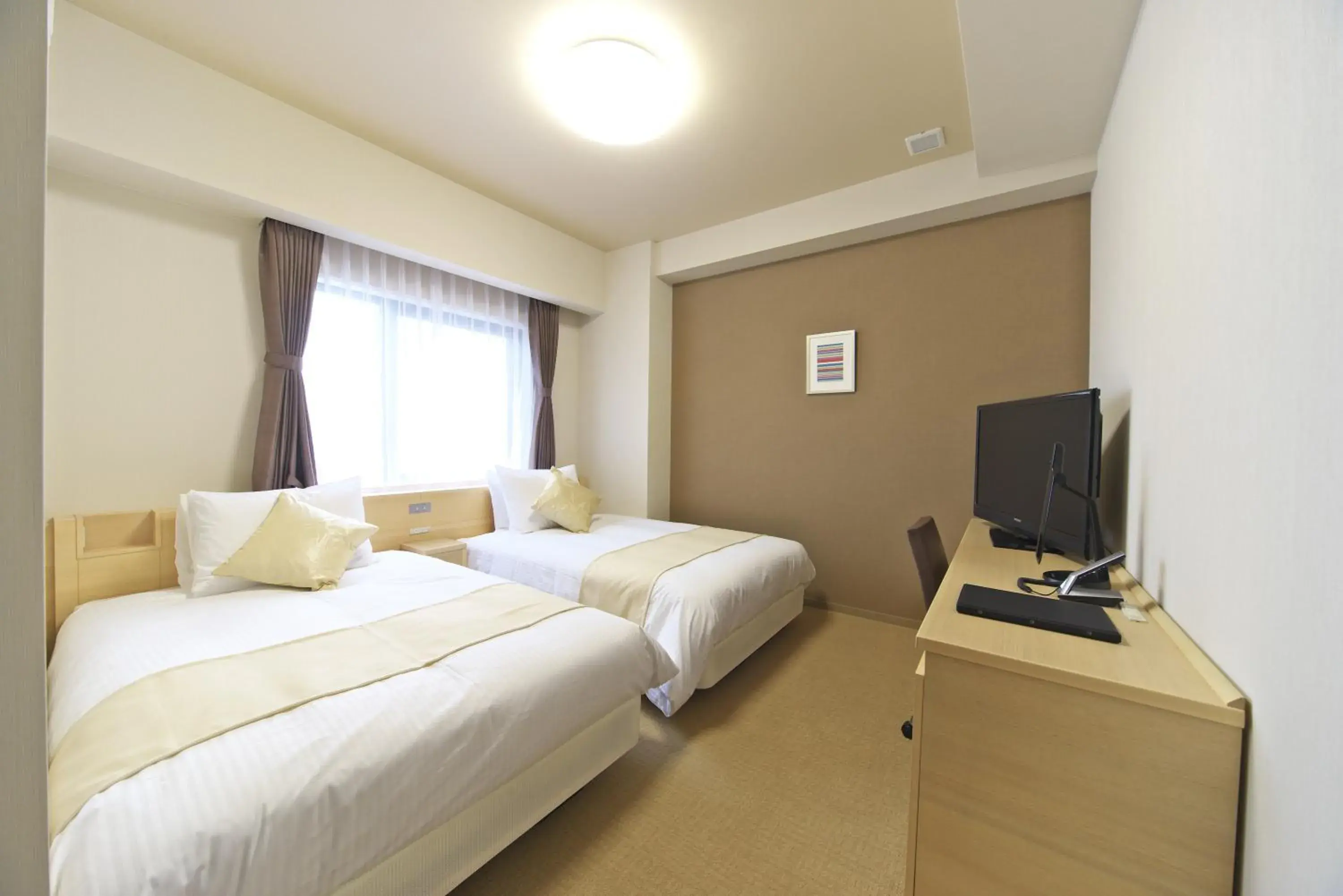 Photo of the whole room, Bed in Shizutetsu Hotel Prezio Numazu