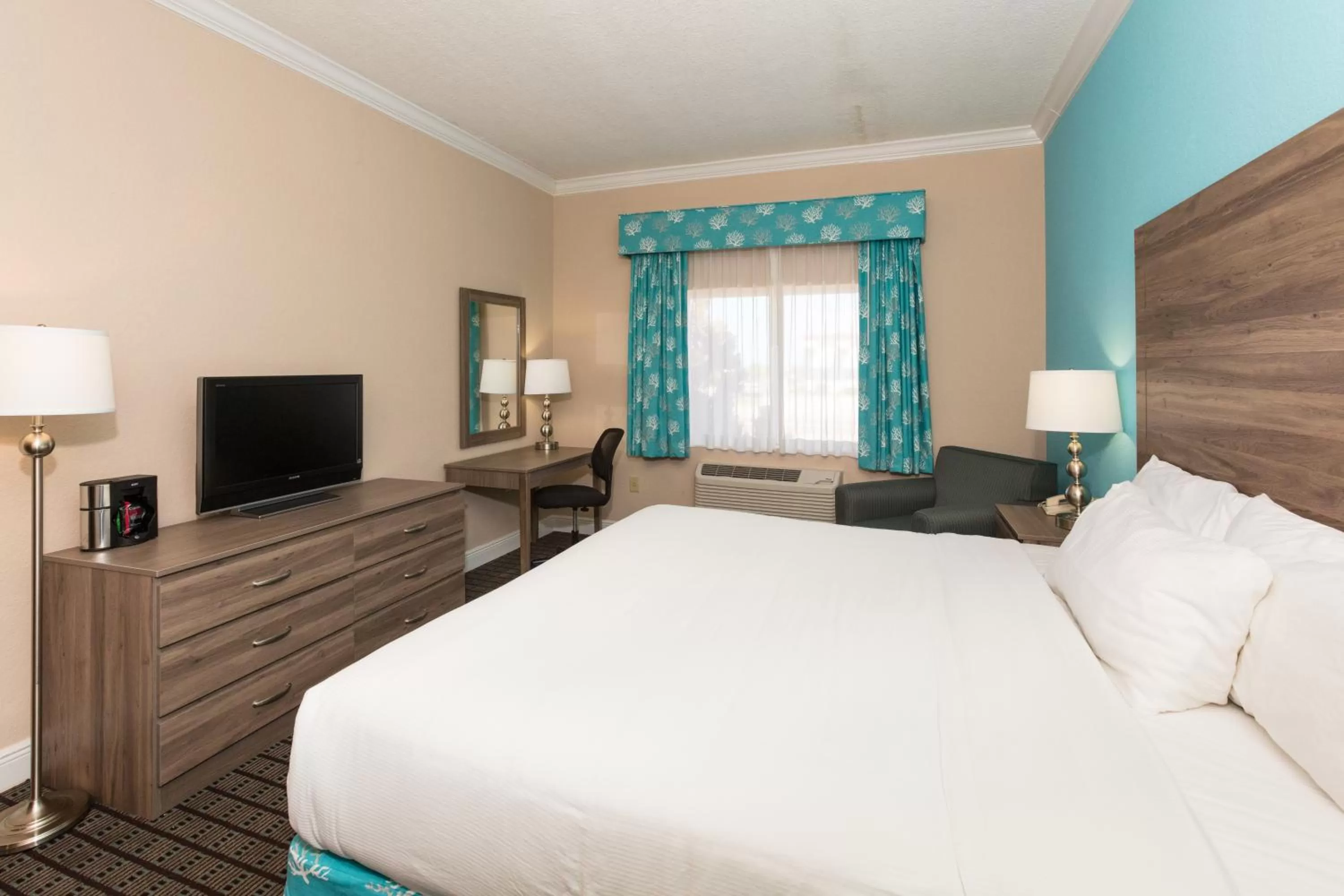 Bed in Amelia Hotel at the Beach