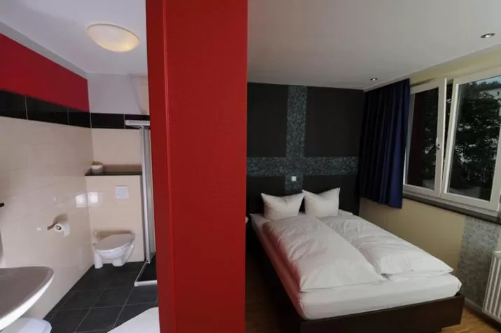 Photo of the whole room, Bed in HOLI-Berlin Hotel