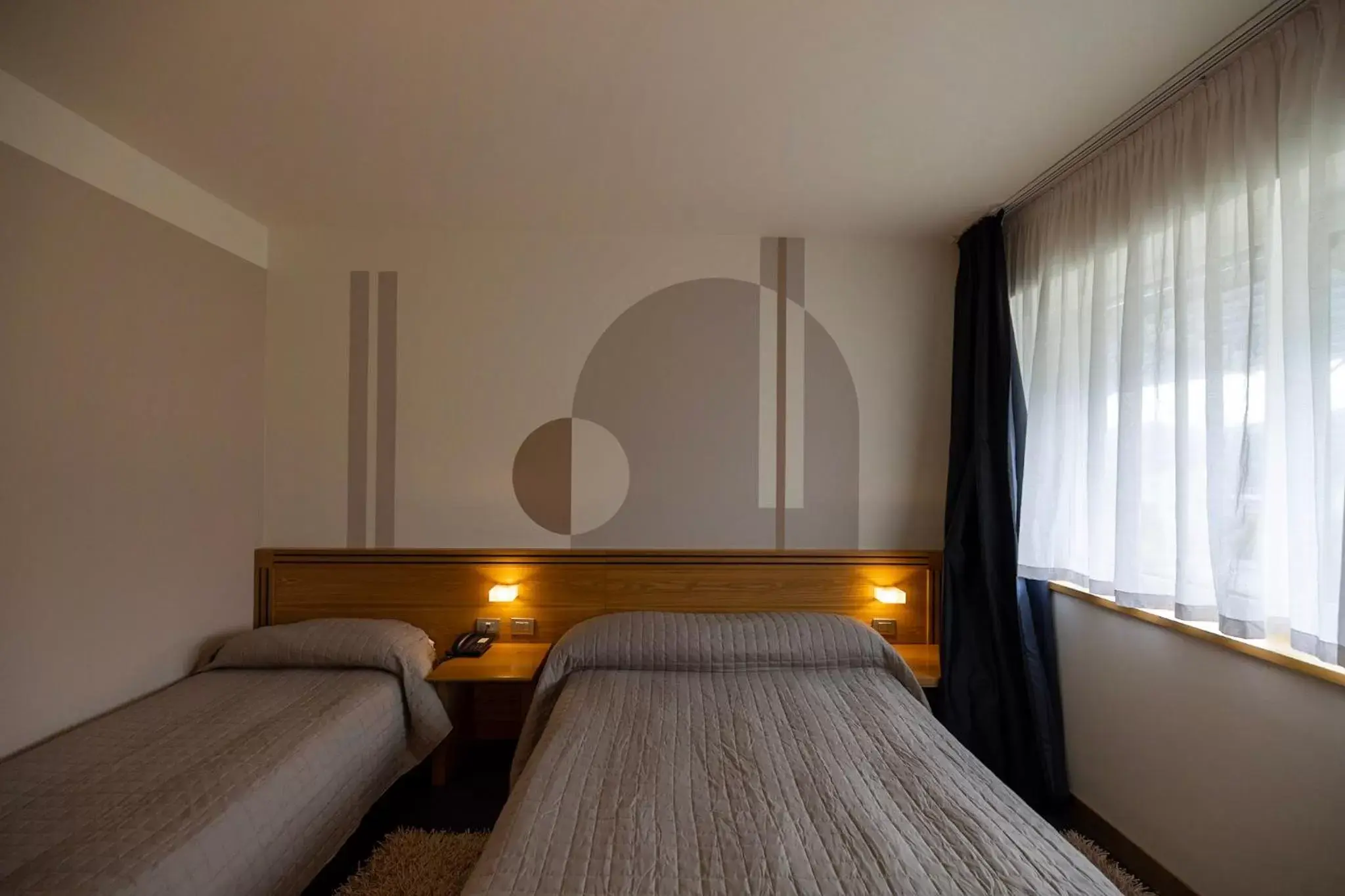 Bed in Hotel Europa Belluno