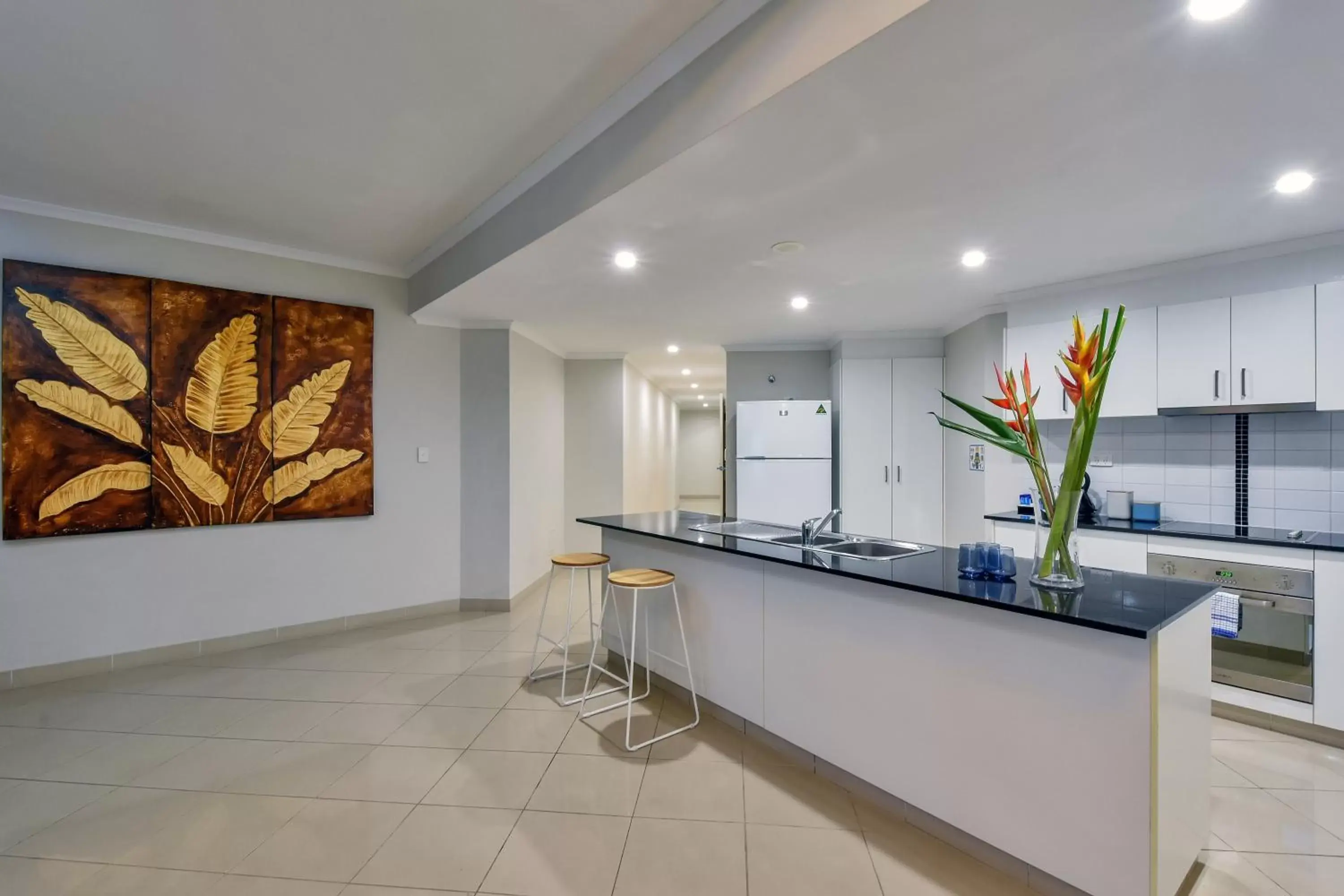 Kitchen or kitchenette, Lobby/Reception in Argus Apartments Darwin