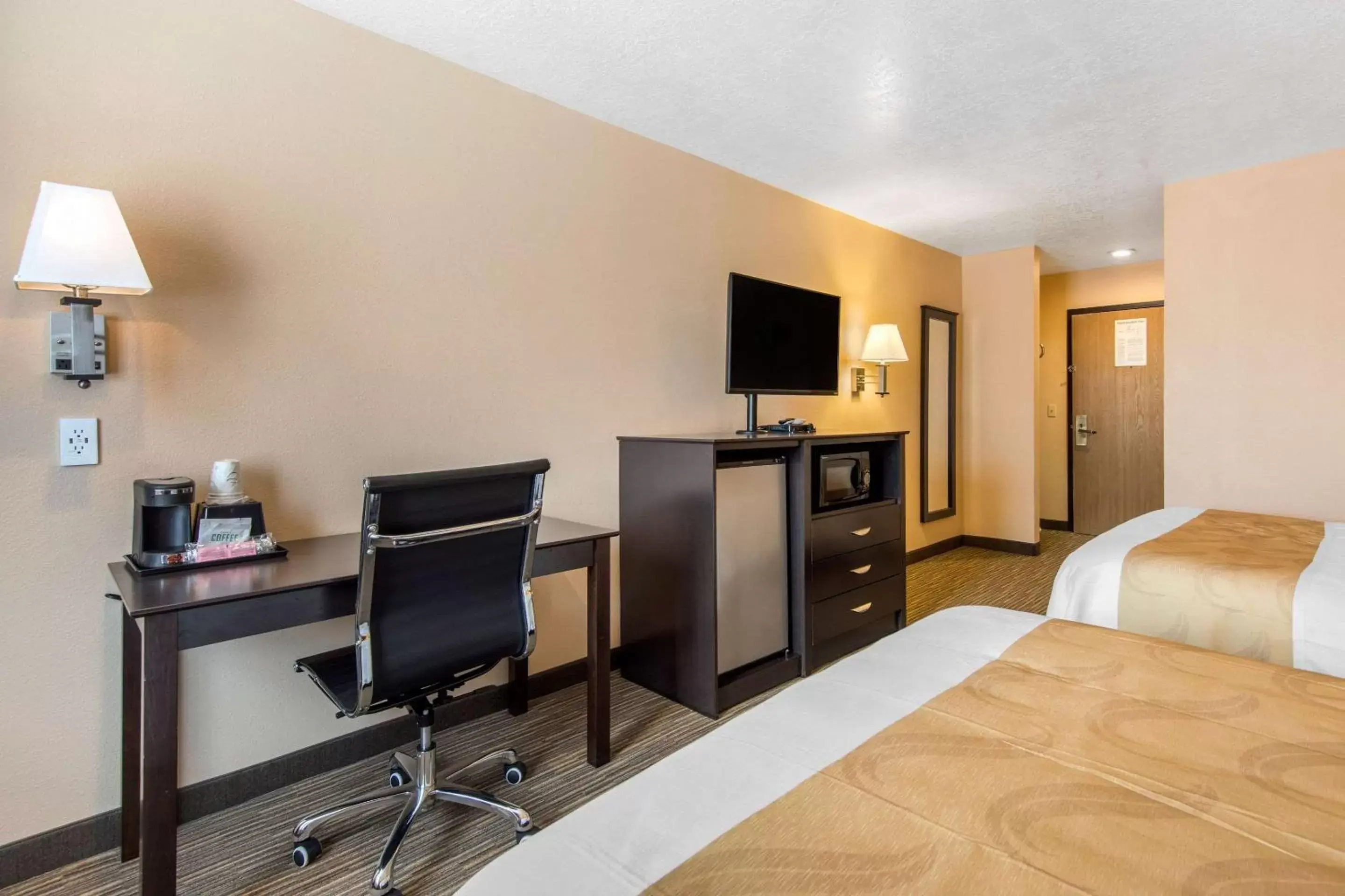 Photo of the whole room, TV/Entertainment Center in Quality Inn & Suites Albuquerque North near Balloon Fiesta Park