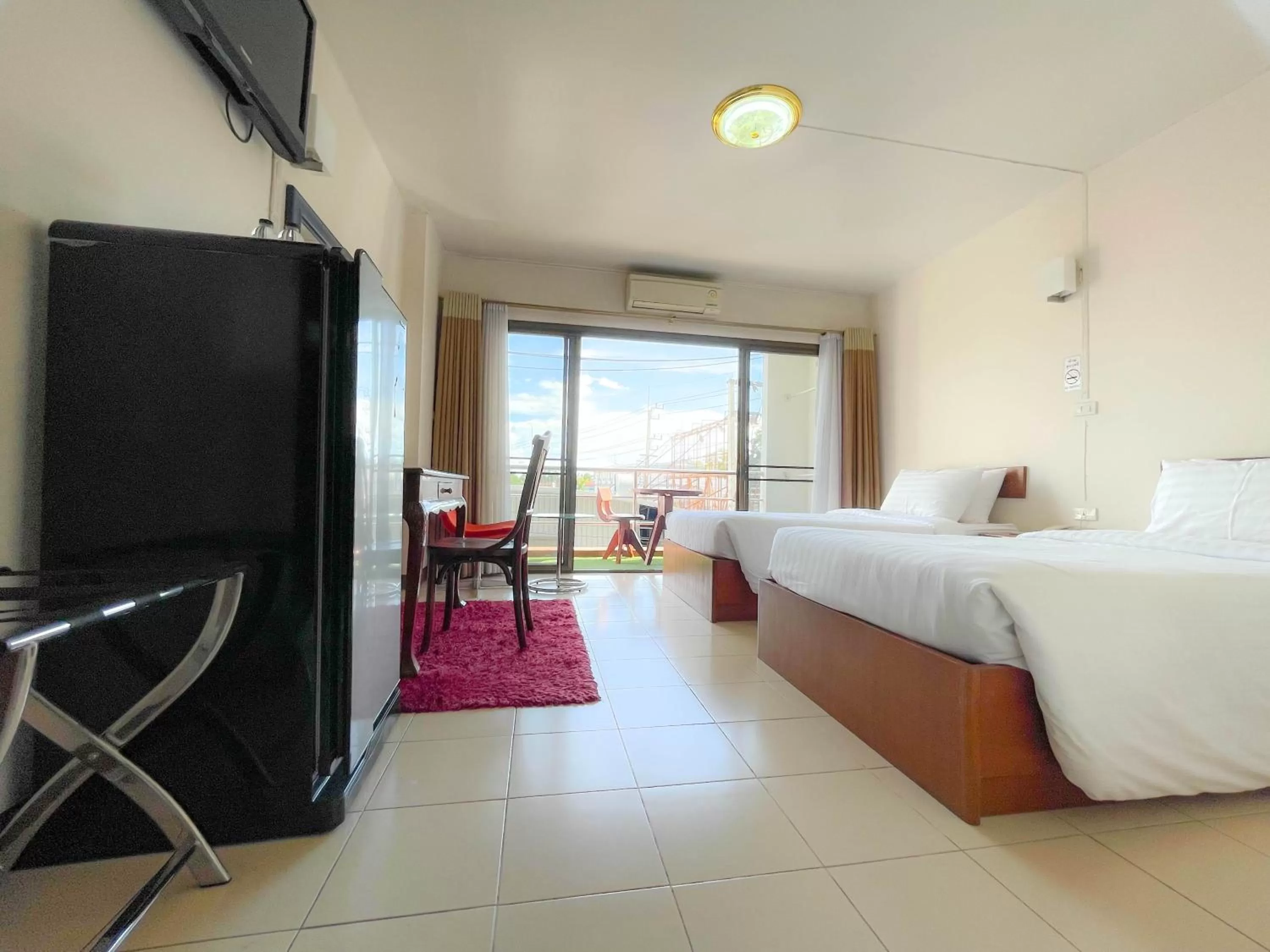 Communal lounge/ TV room, Bed in Phusuang Place