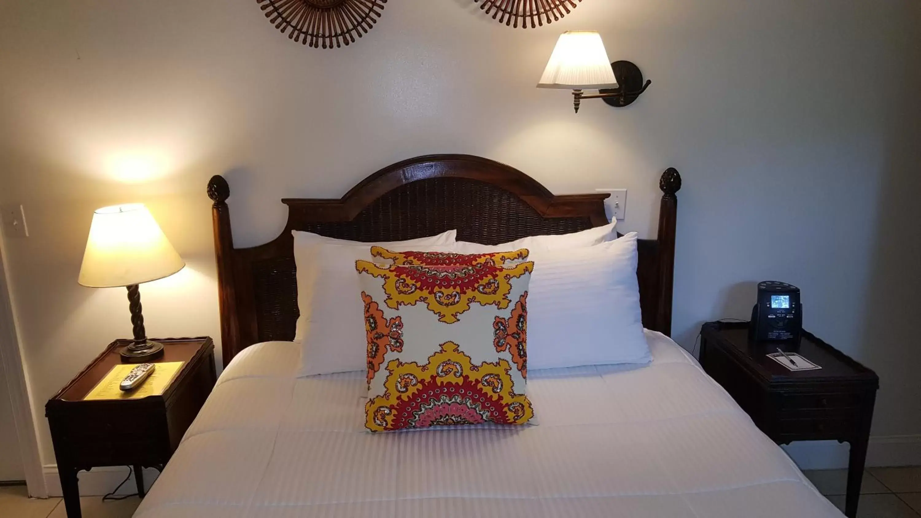 Photo of the whole room, Bed in The Caribbean Court Boutique Hotel