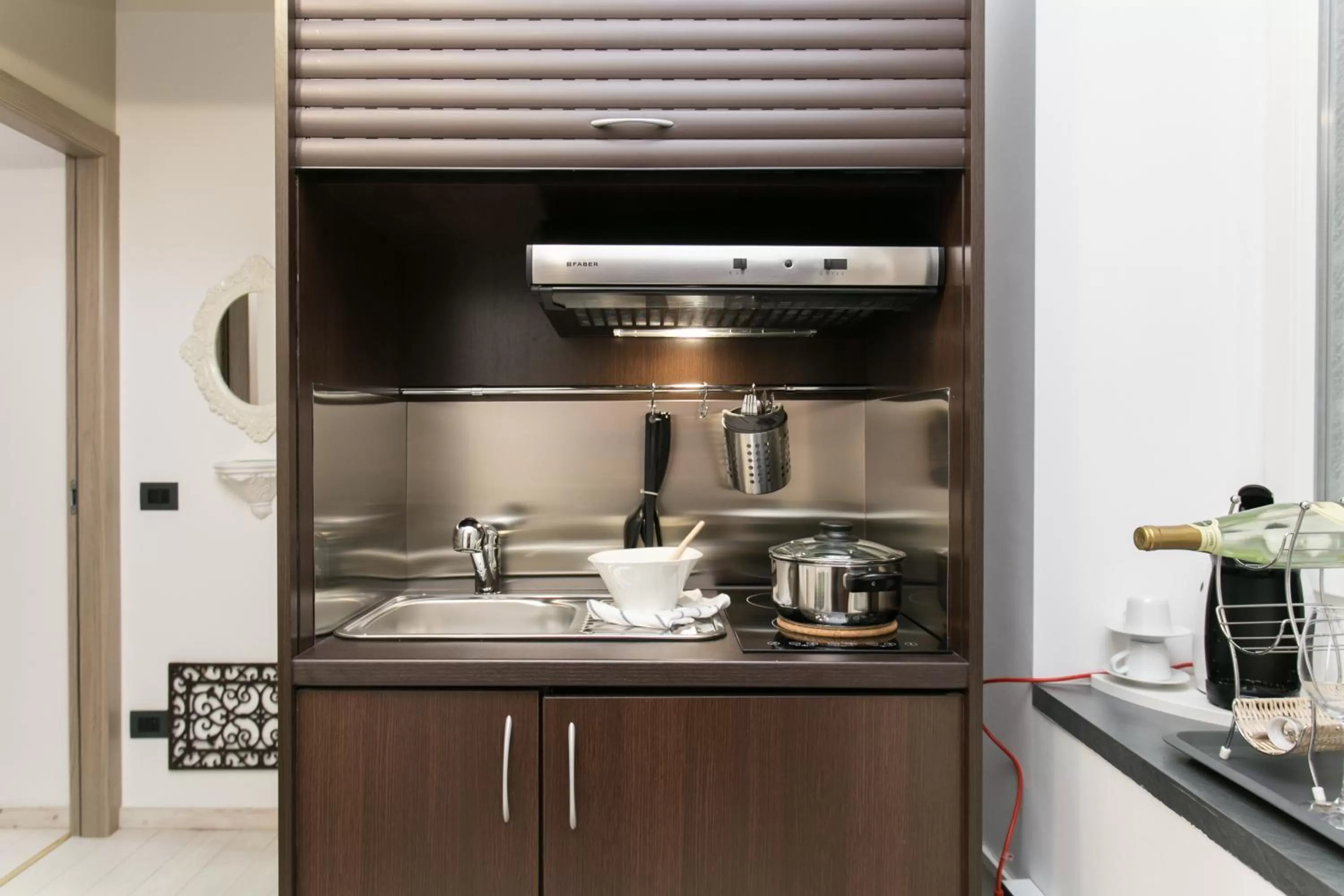 Communal kitchen in Aparthotel Dei Mercanti