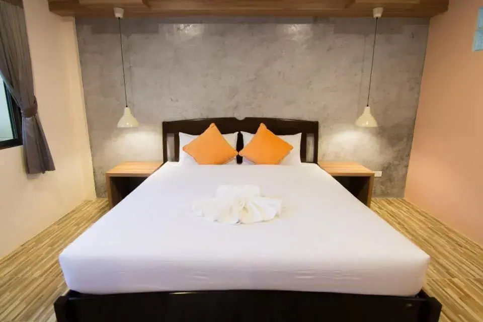 Bed in K.L. Boutique Hotel