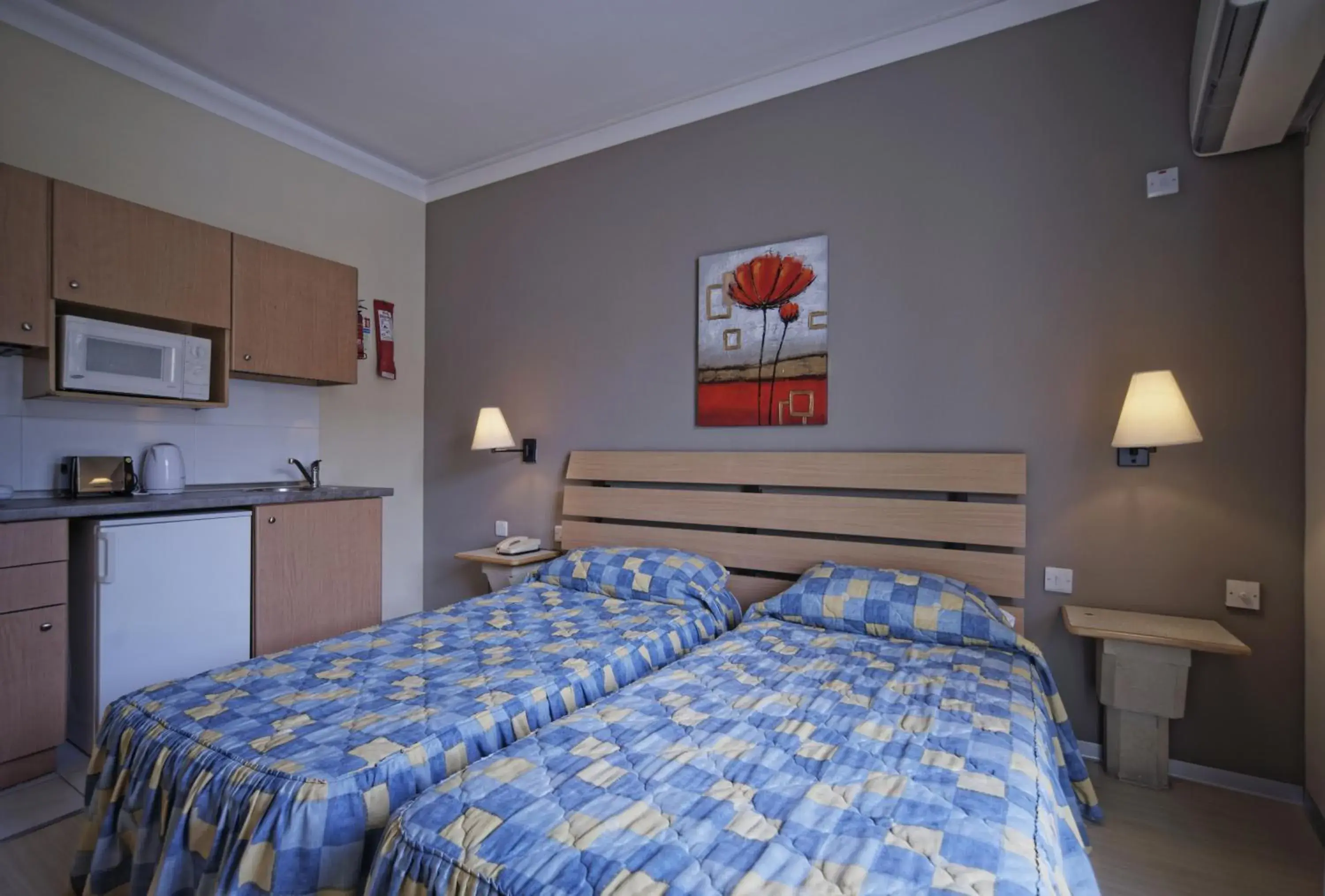 Photo of the whole room, Bed in Porto Azzurro Aparthotel
