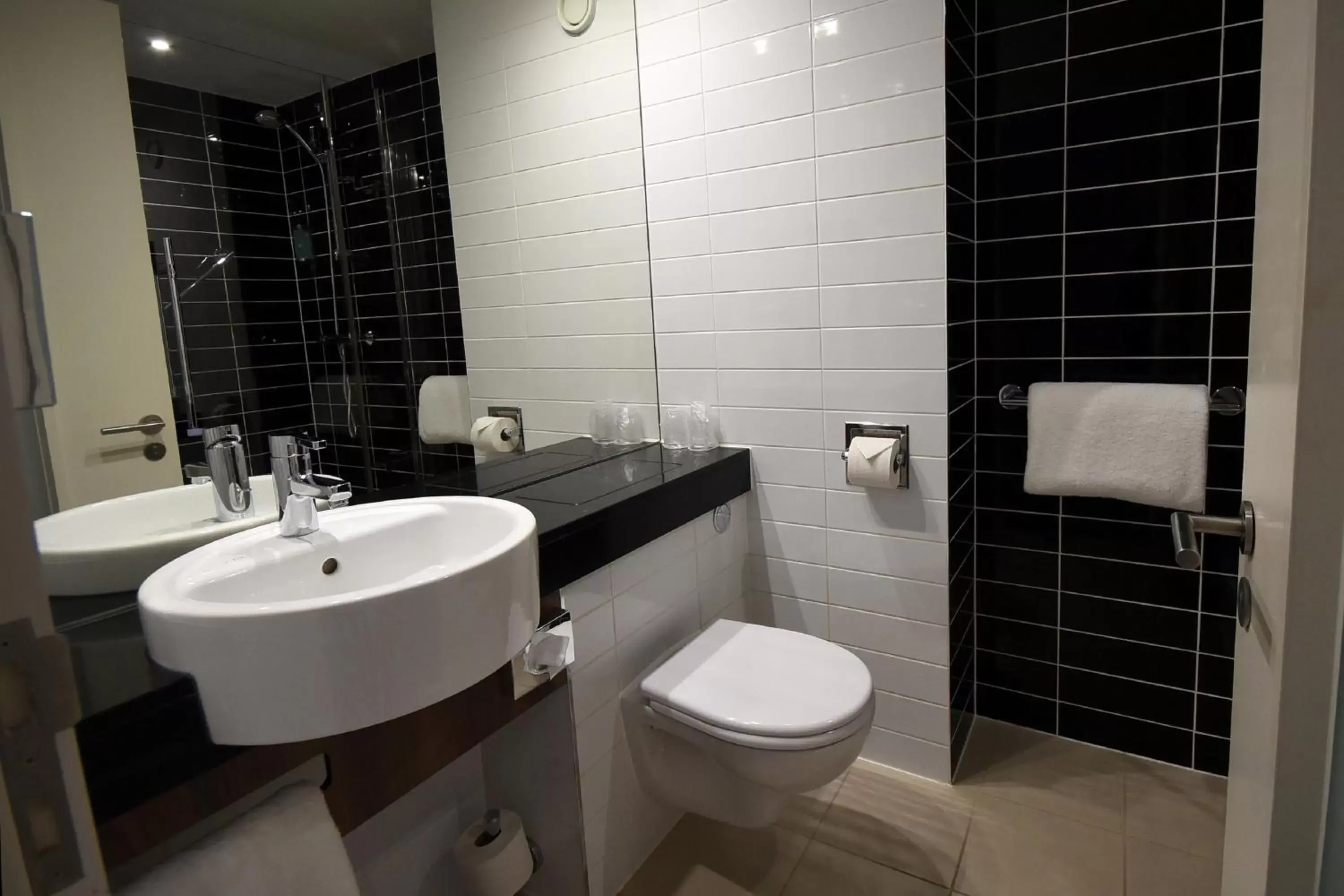 Toilet, Bathroom in Holiday Inn Express Manchester City Centre Arena, an IHG Hotel