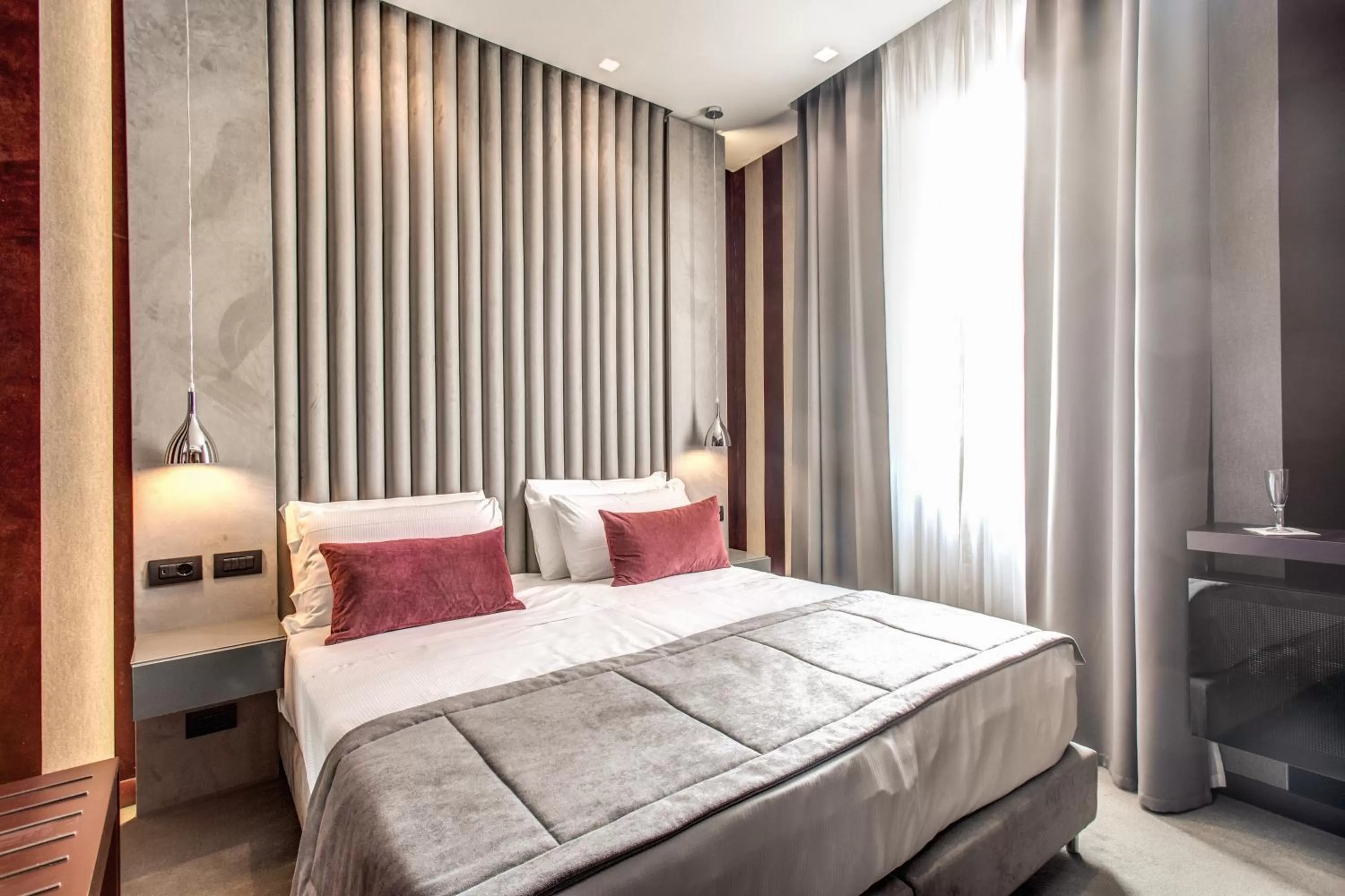 Bed in Doria Palace Boutique Hotel