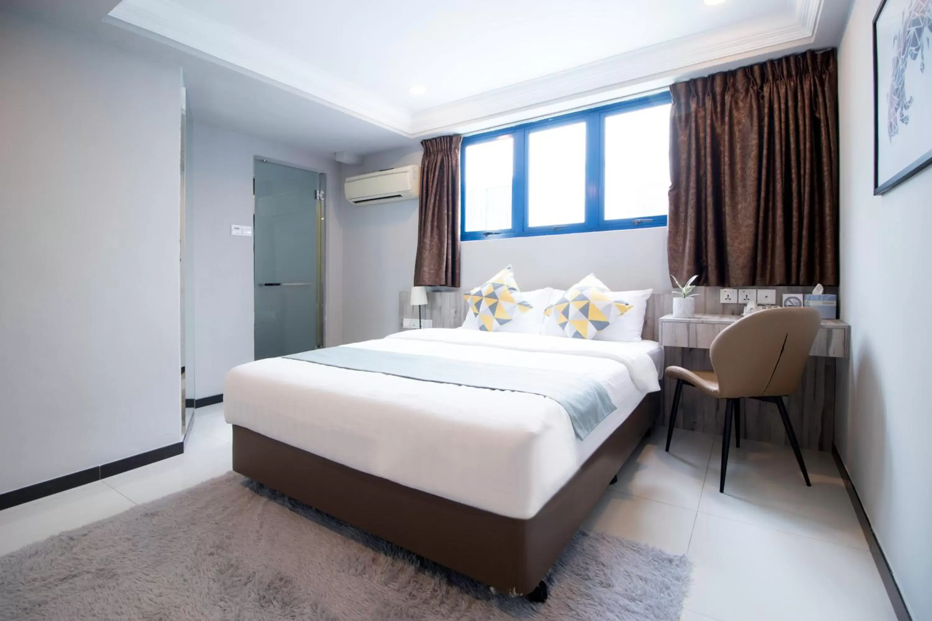 Bedroom in Harbour Ville Hotel