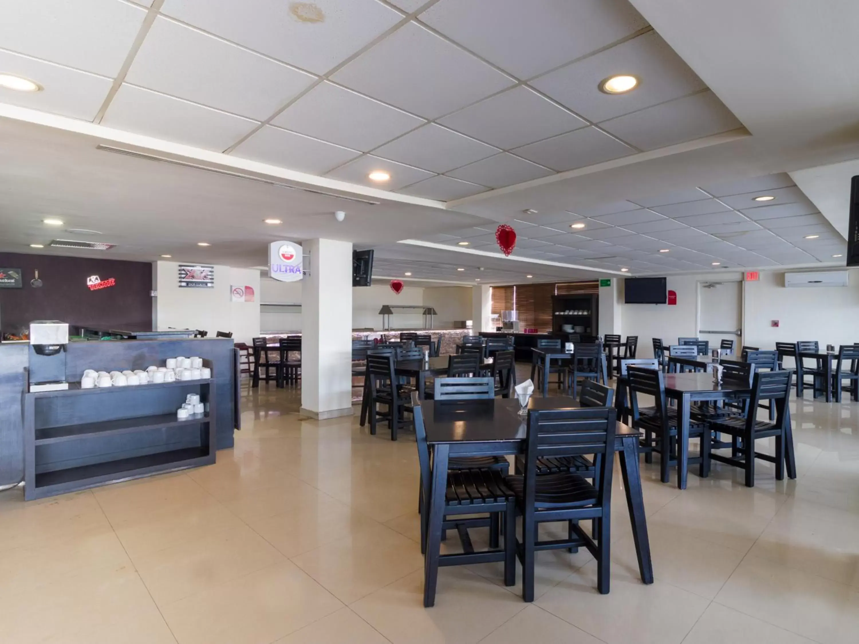 Restaurant/Places to Eat in Capital O Hotel Herederos, Piedras Negras