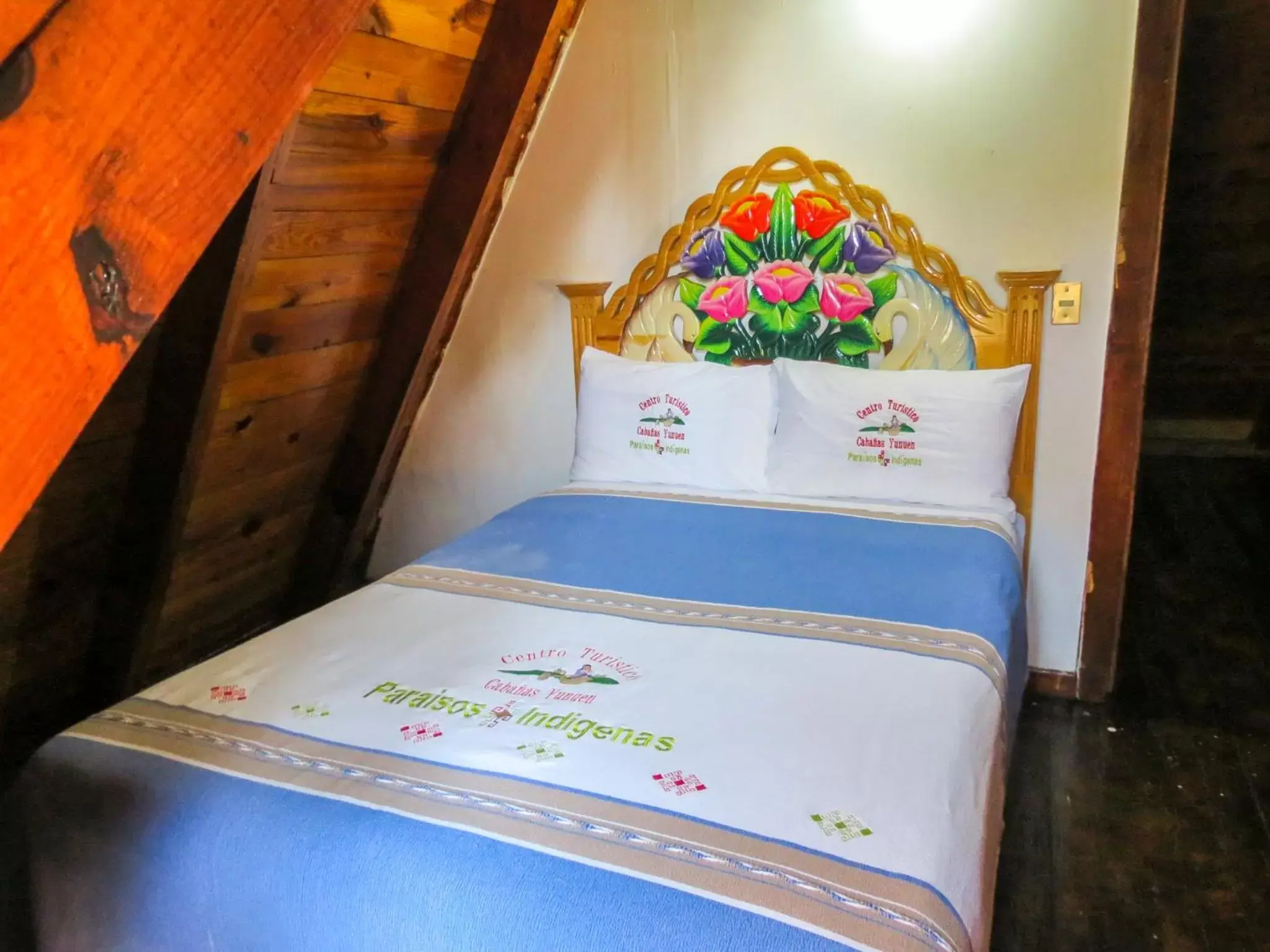 Bed in Cabañas Yunuén by Rotamundos